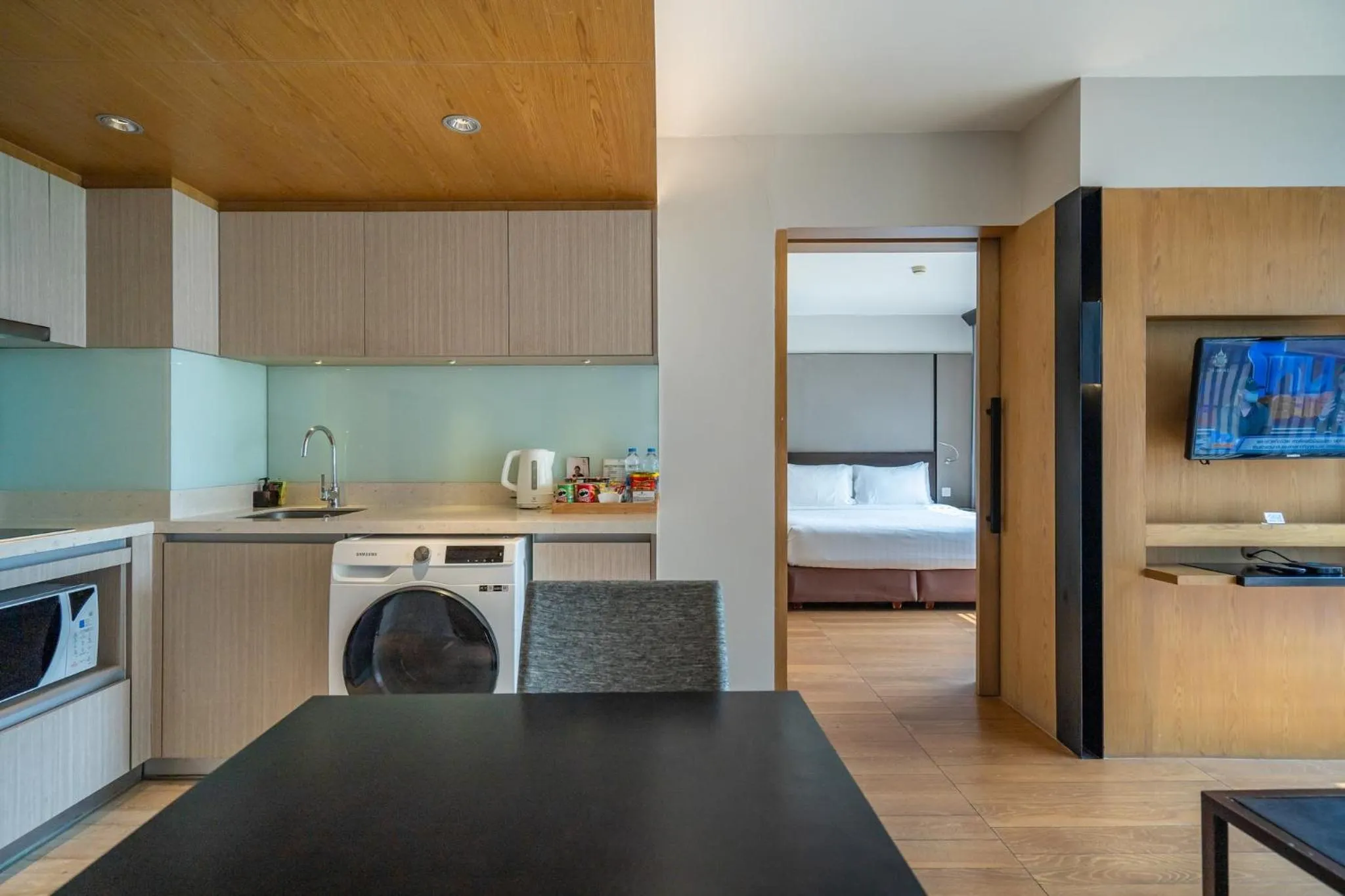 Living room, Bed in Arcadia Suites Bangkok