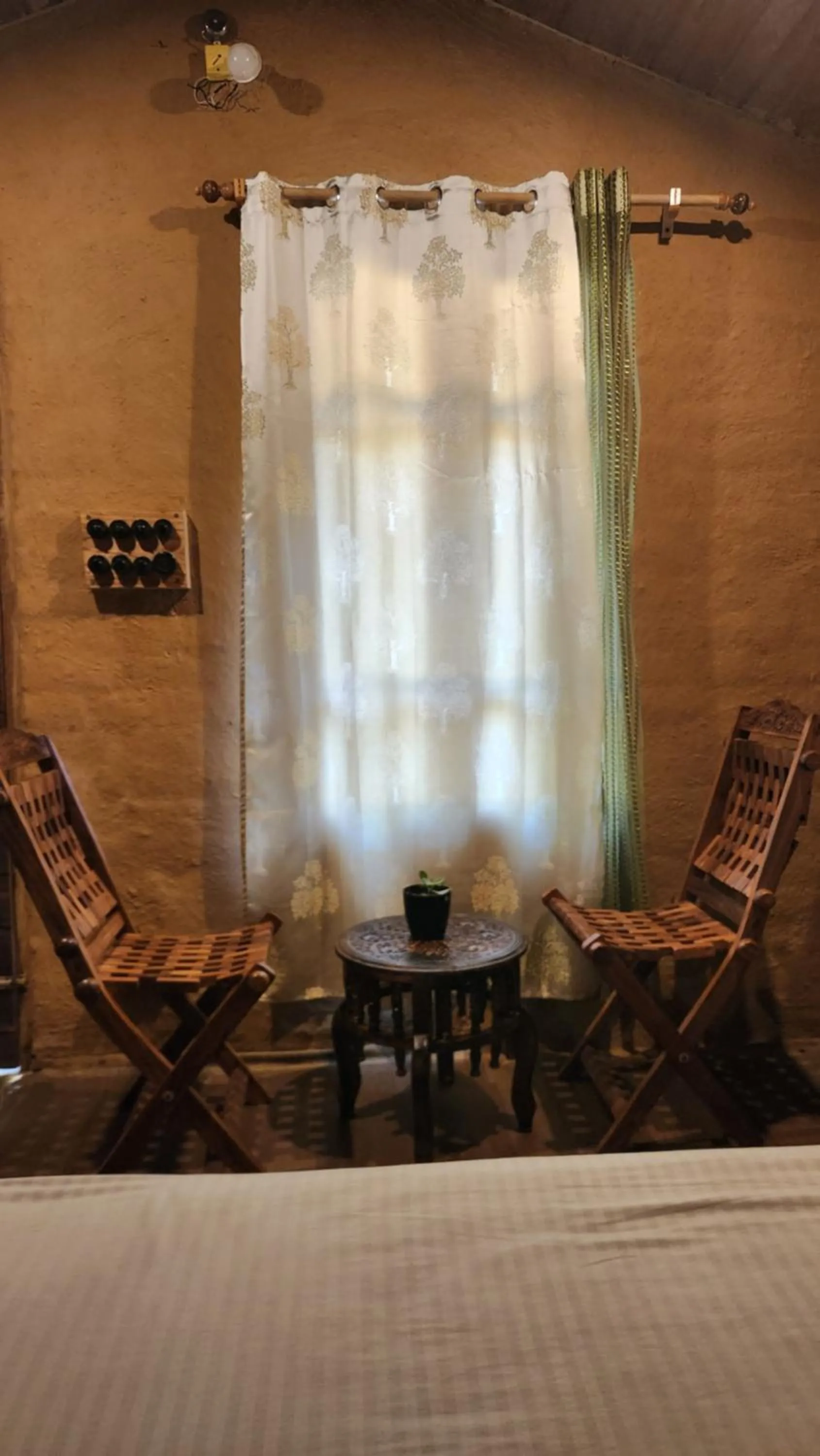 Living room in Monkey Mud House and Camps, Bir
