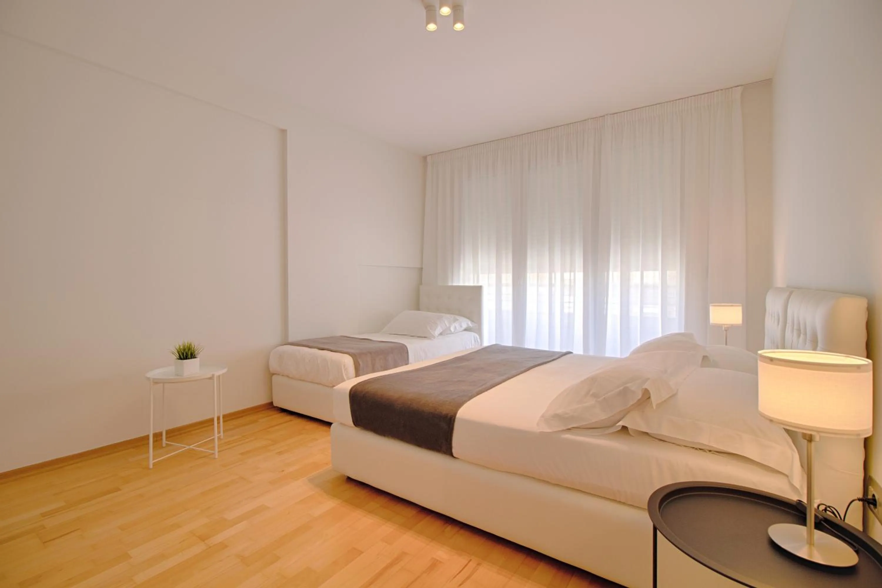 Bedroom, Bed in THE ROOMS - Serviced Apartments Tirana
