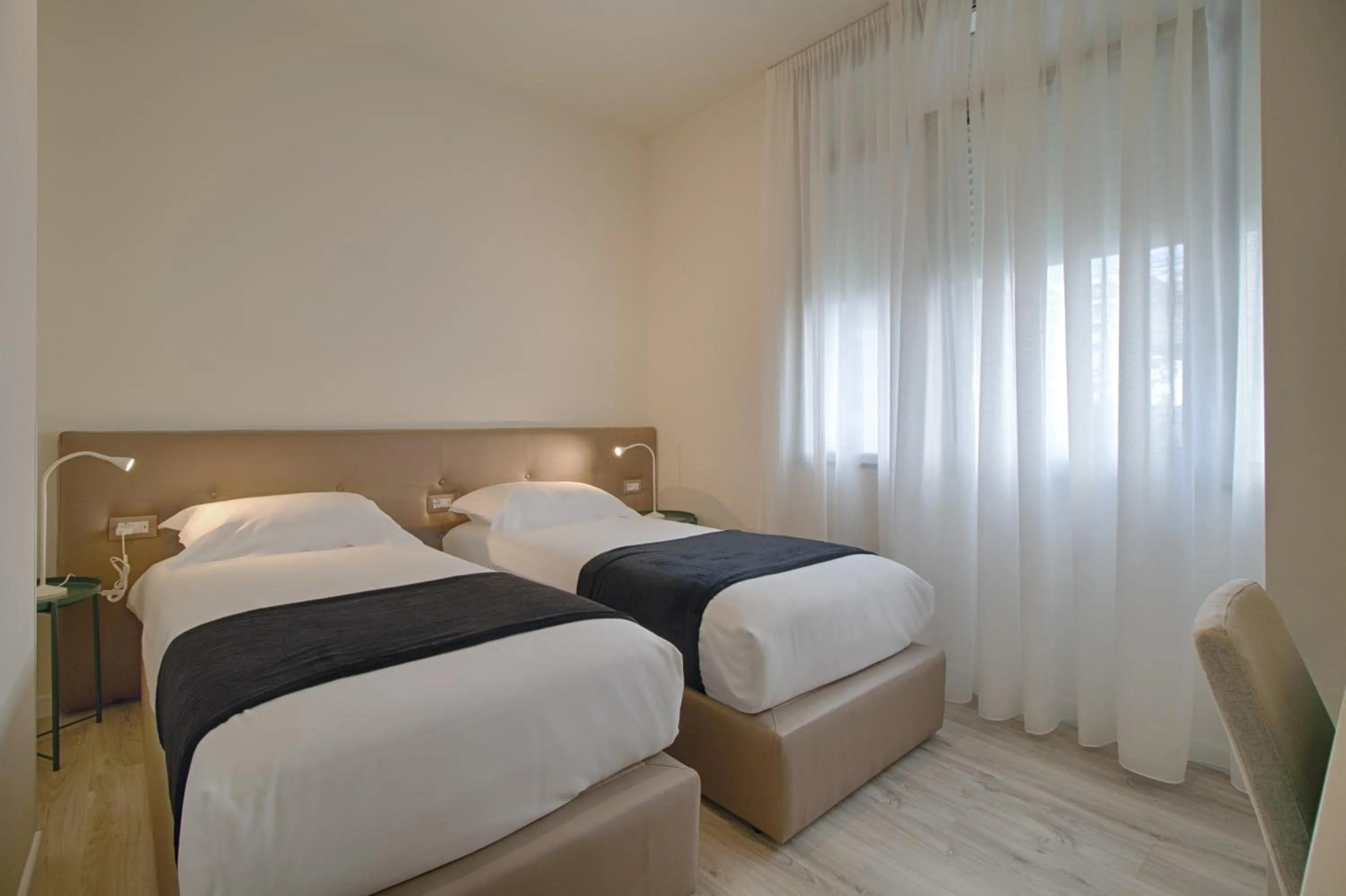 Bathroom, Bed in THE ROOMS - Serviced Apartments Tirana
