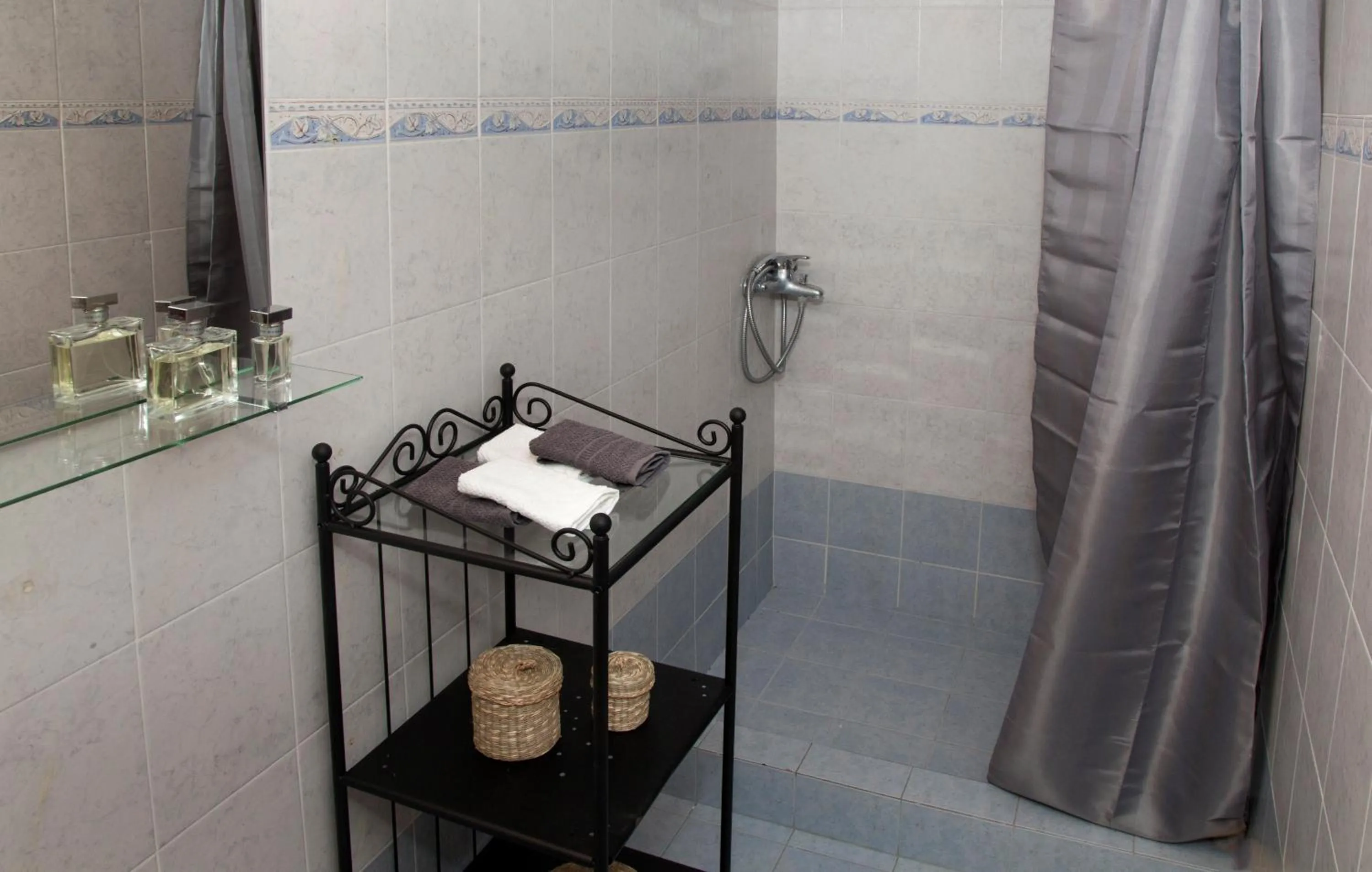 Shower in Athens Jem near the Archaeological Museum by GHH