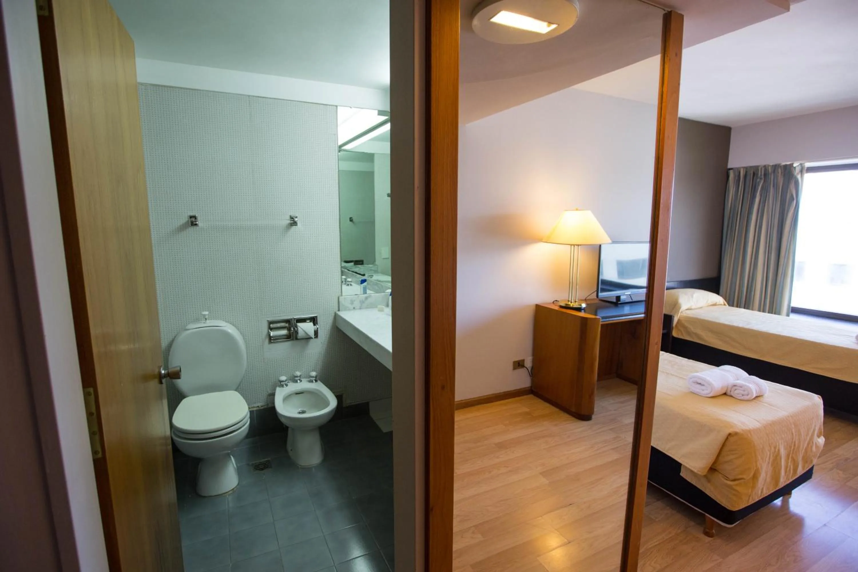 Bathroom, Bed in HOTEL BARILOCHE CITY