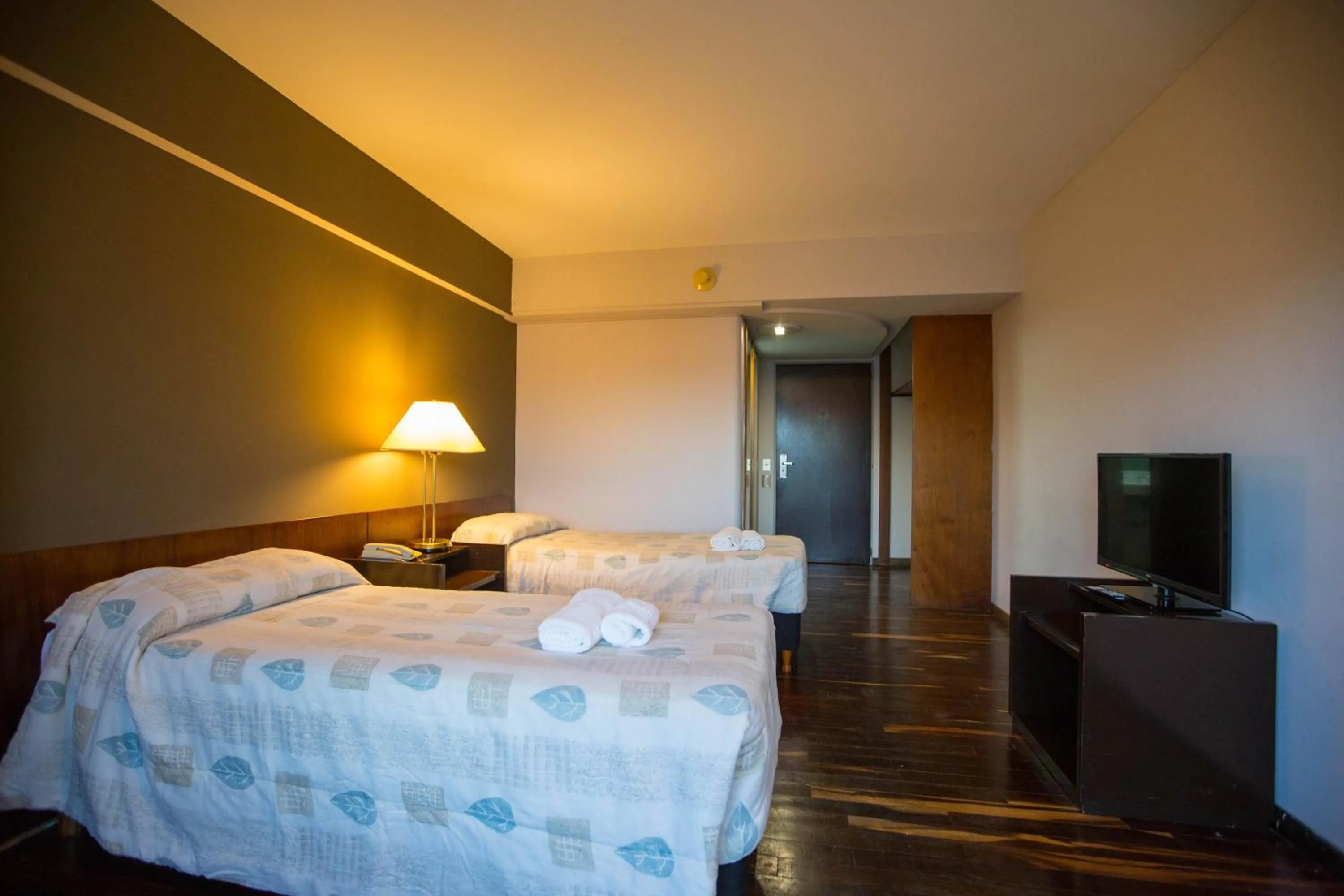 Photo of the whole room, Bed in HOTEL BARILOCHE CITY