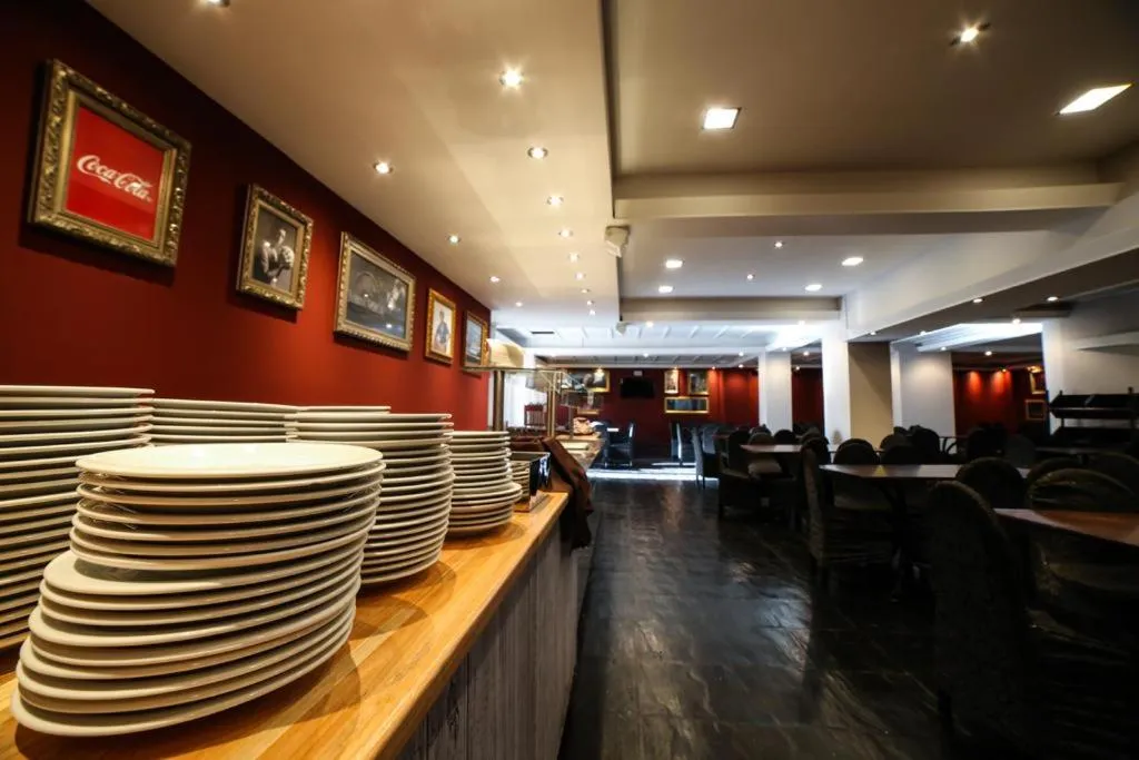 Lounge or bar in HOTEL BARILOCHE CITY