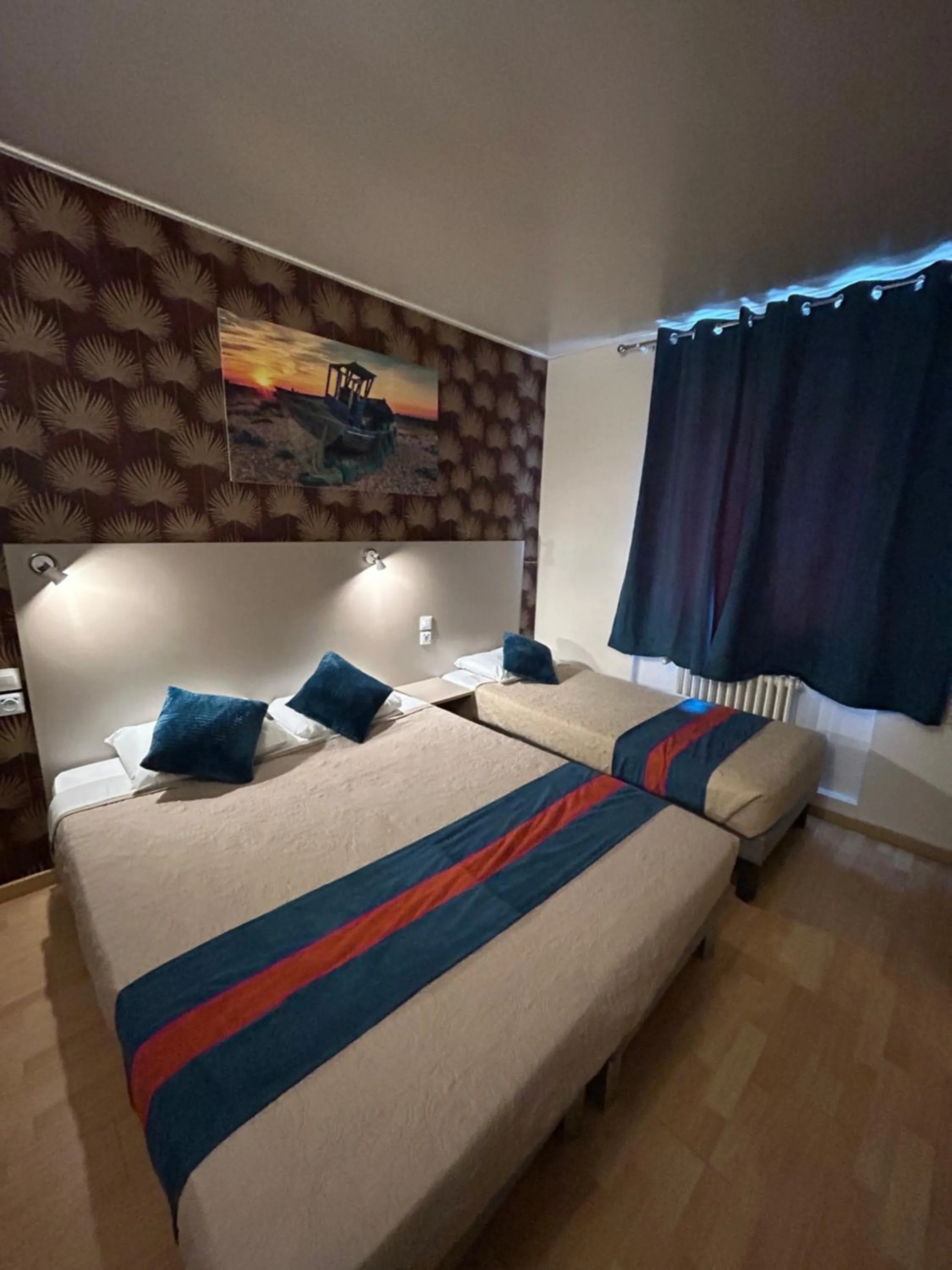 Bed in Hotel de Normandie