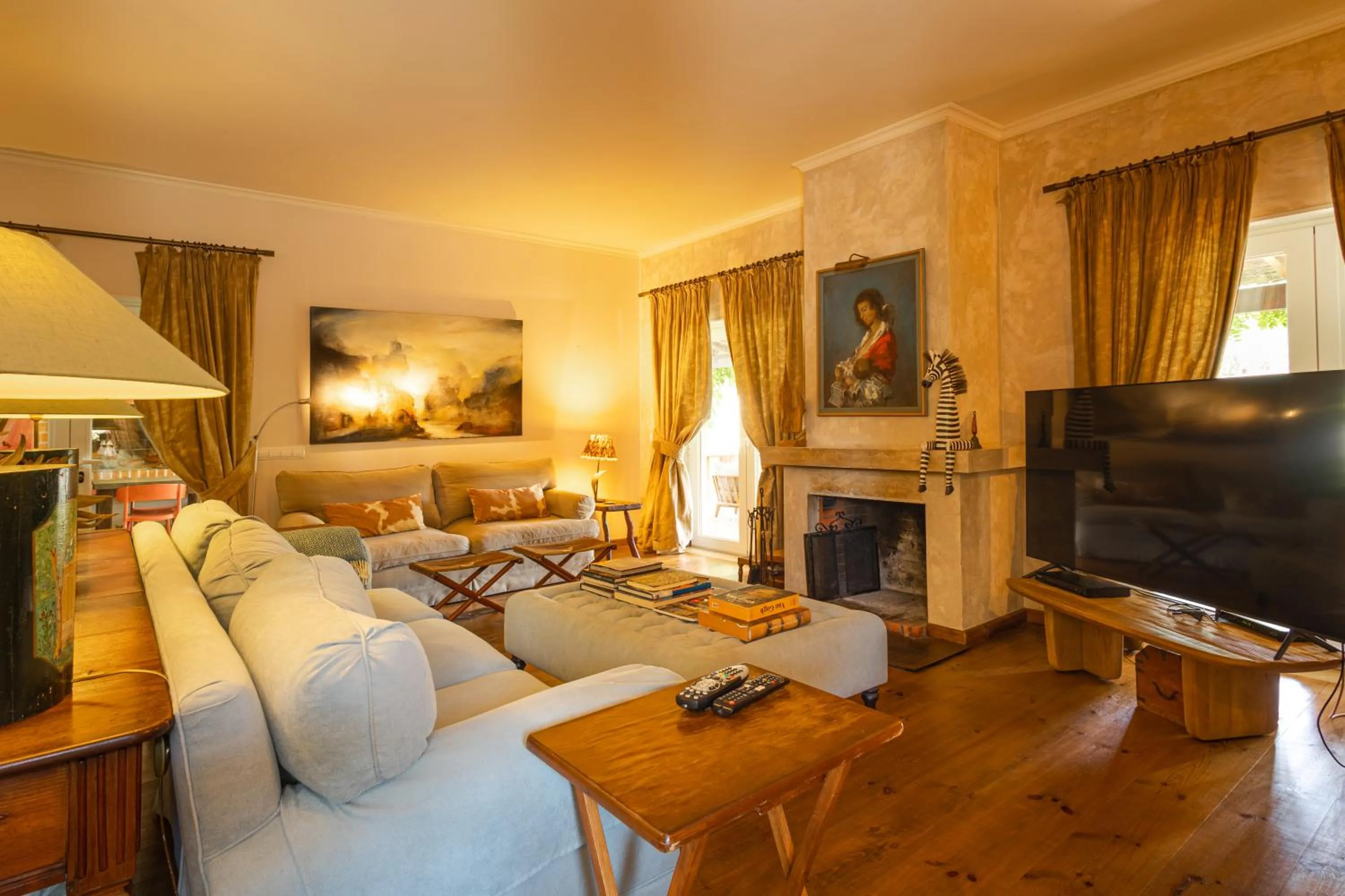 Communal lounge/ TV room in Casa das Cegonhas