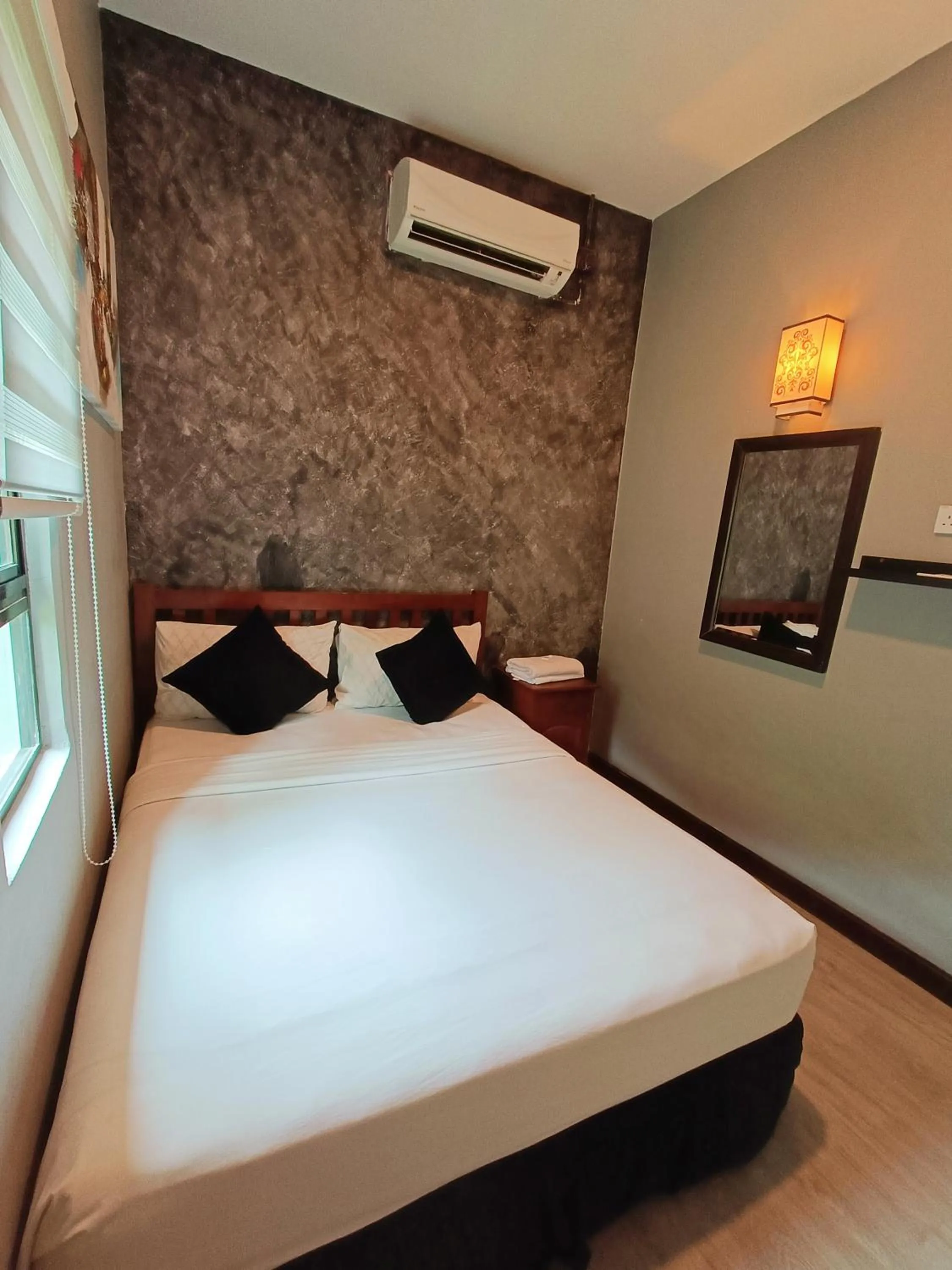 Bed in Tc theme park Guest house