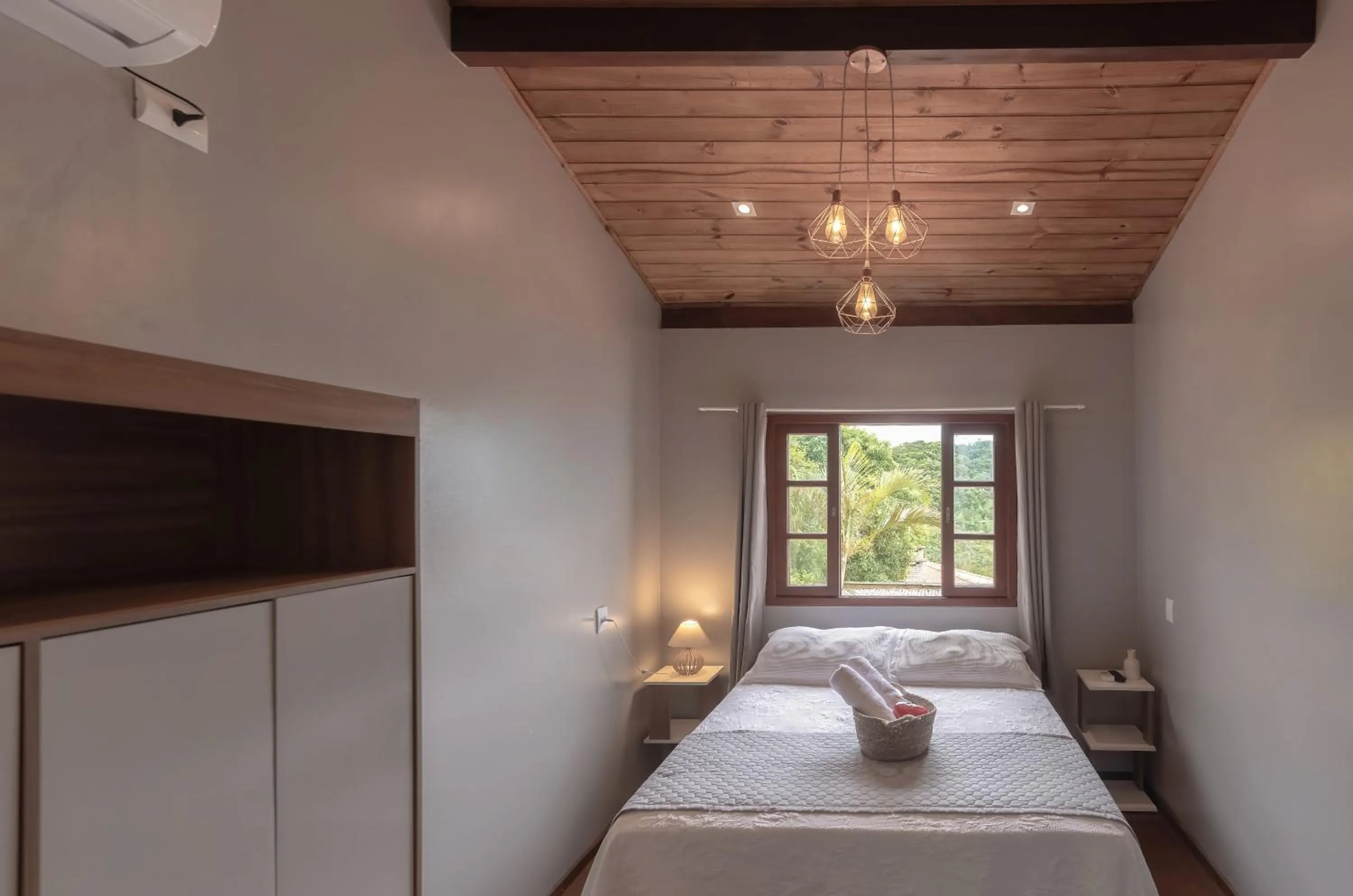 Bed in Pousada Natribus Rosa