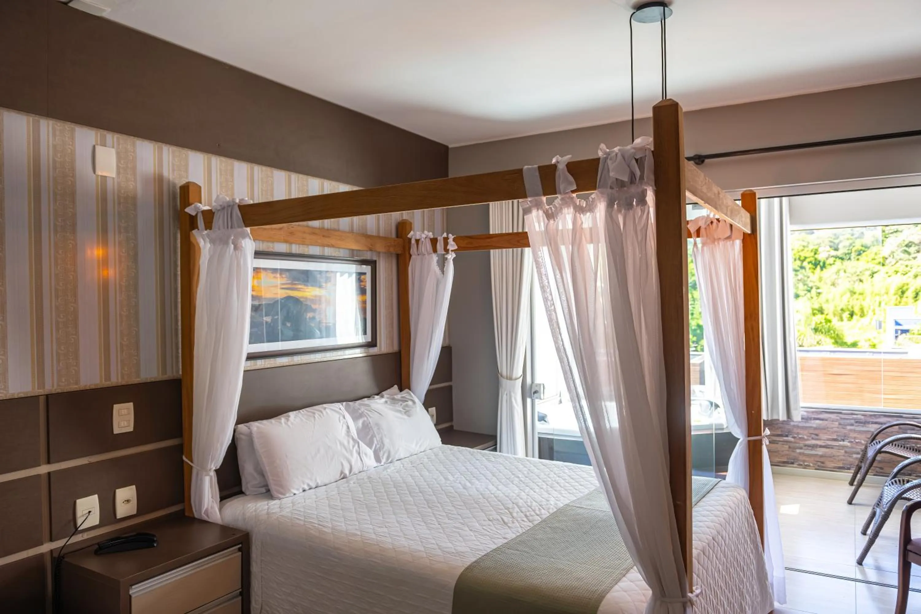 Bed in Pousada Natribus Rosa