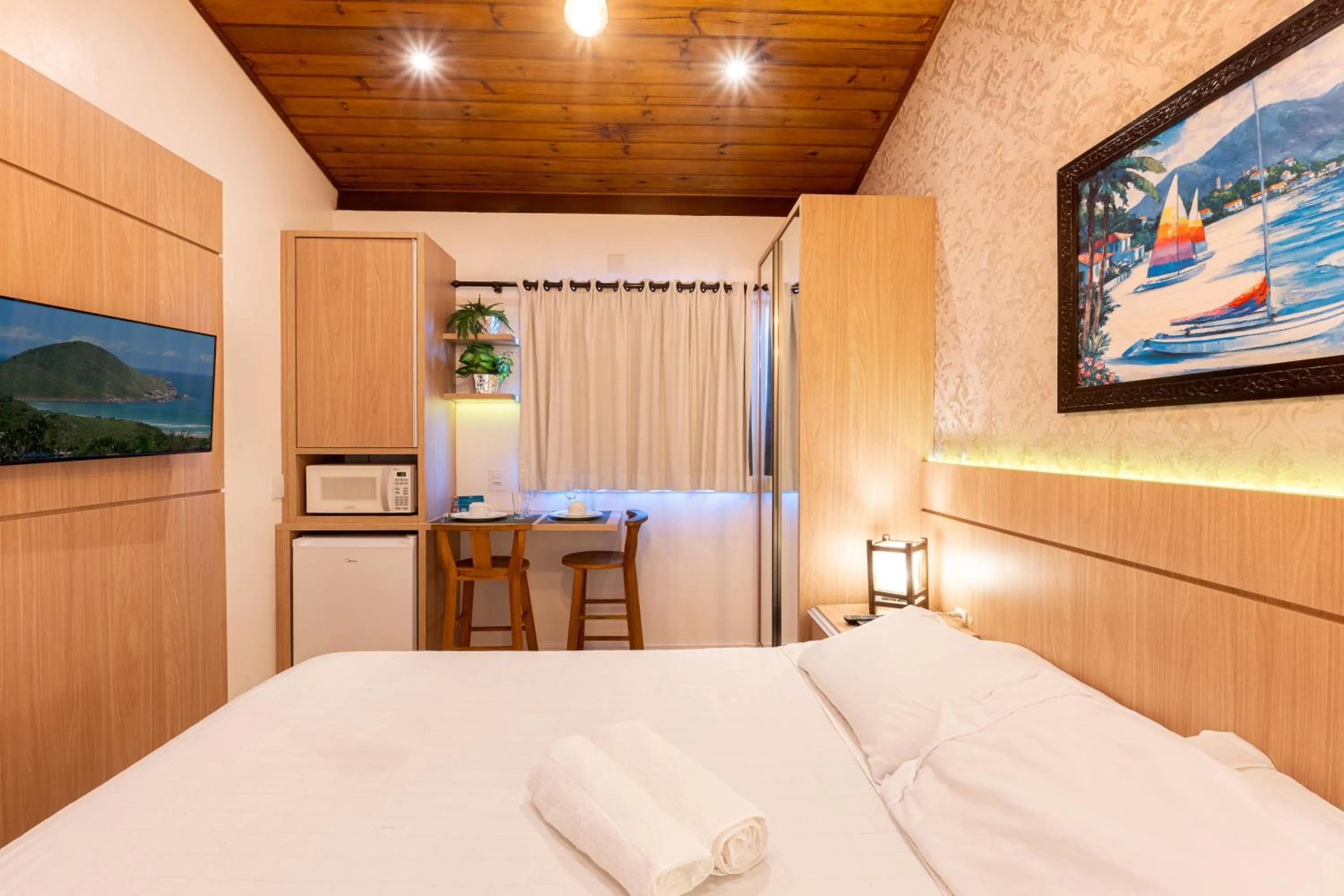 TV and multimedia, Bed in Pousada Natribus Rosa