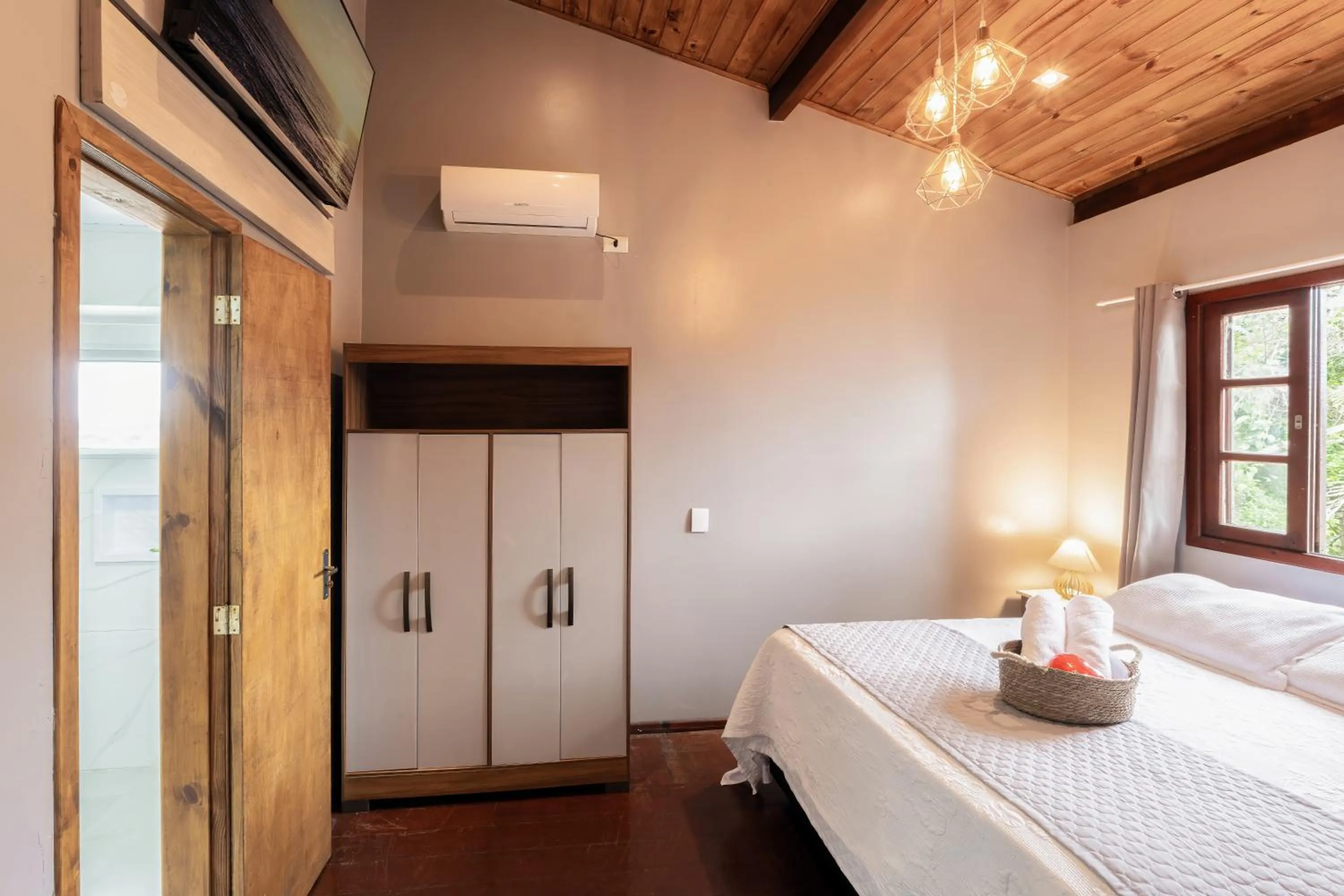 Bed in Pousada Natribus Rosa