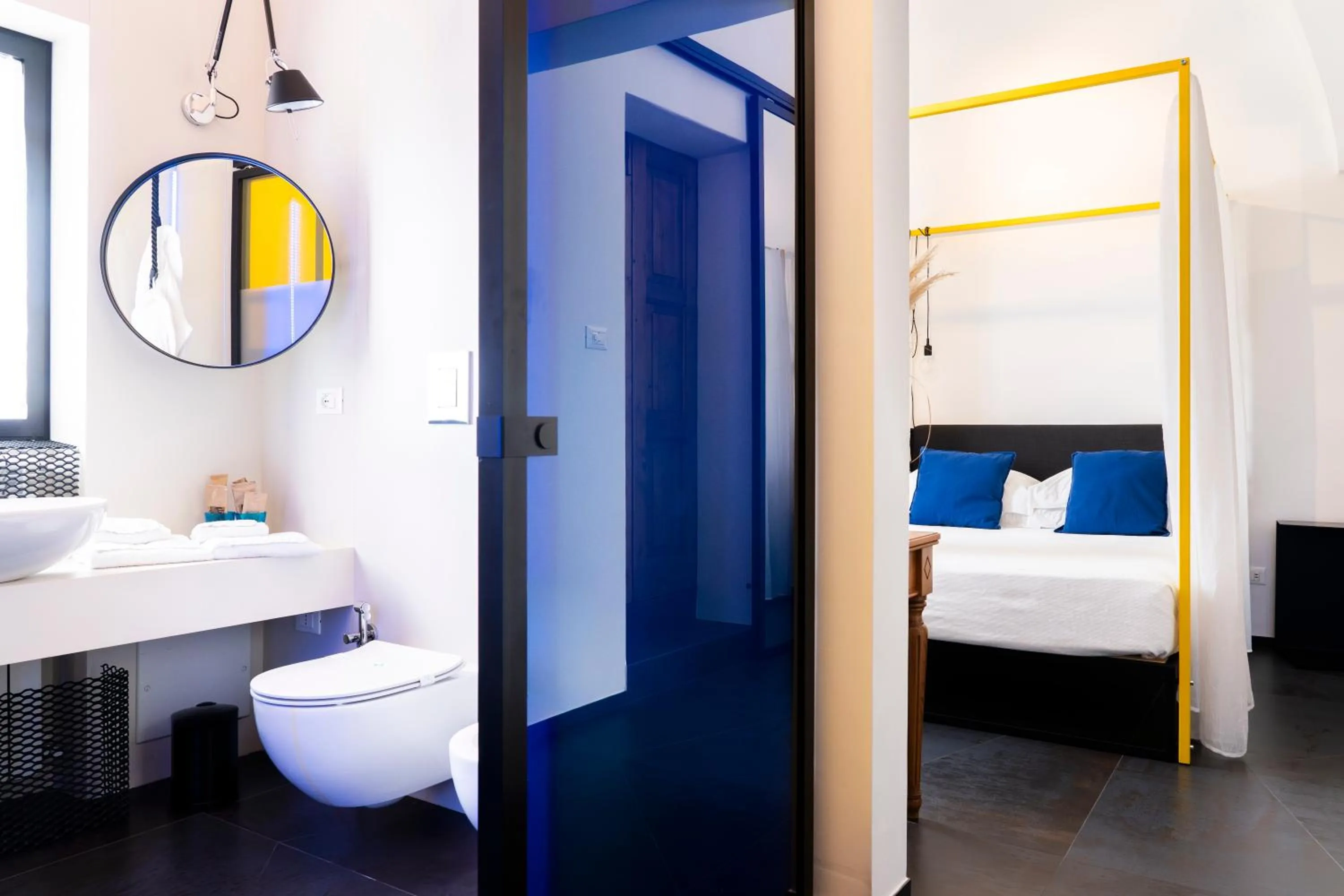 Toilet, Bed in Palazzo Biancofiore, suites & rooftop Ostuni