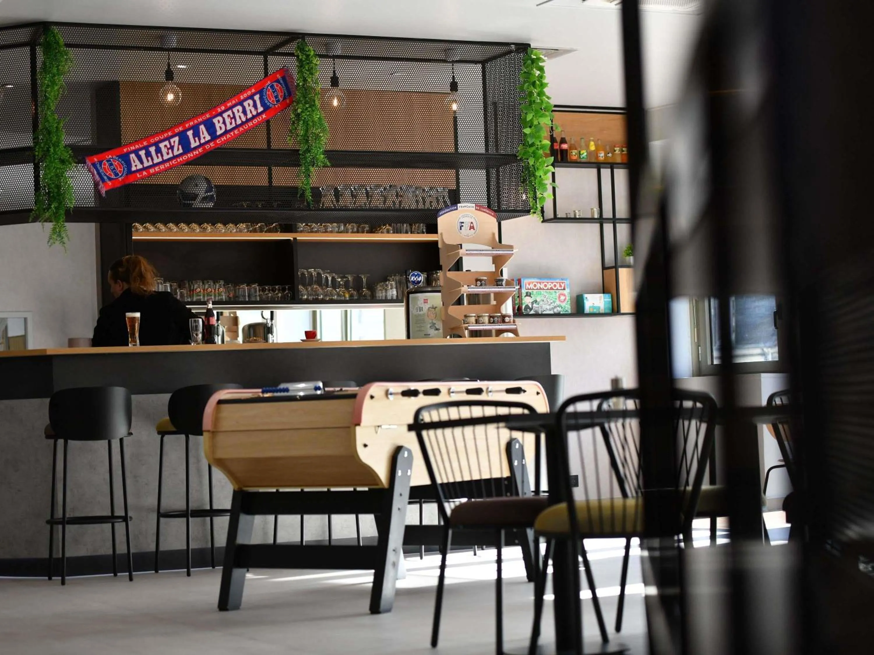 Lounge or bar in ibis Chateauroux