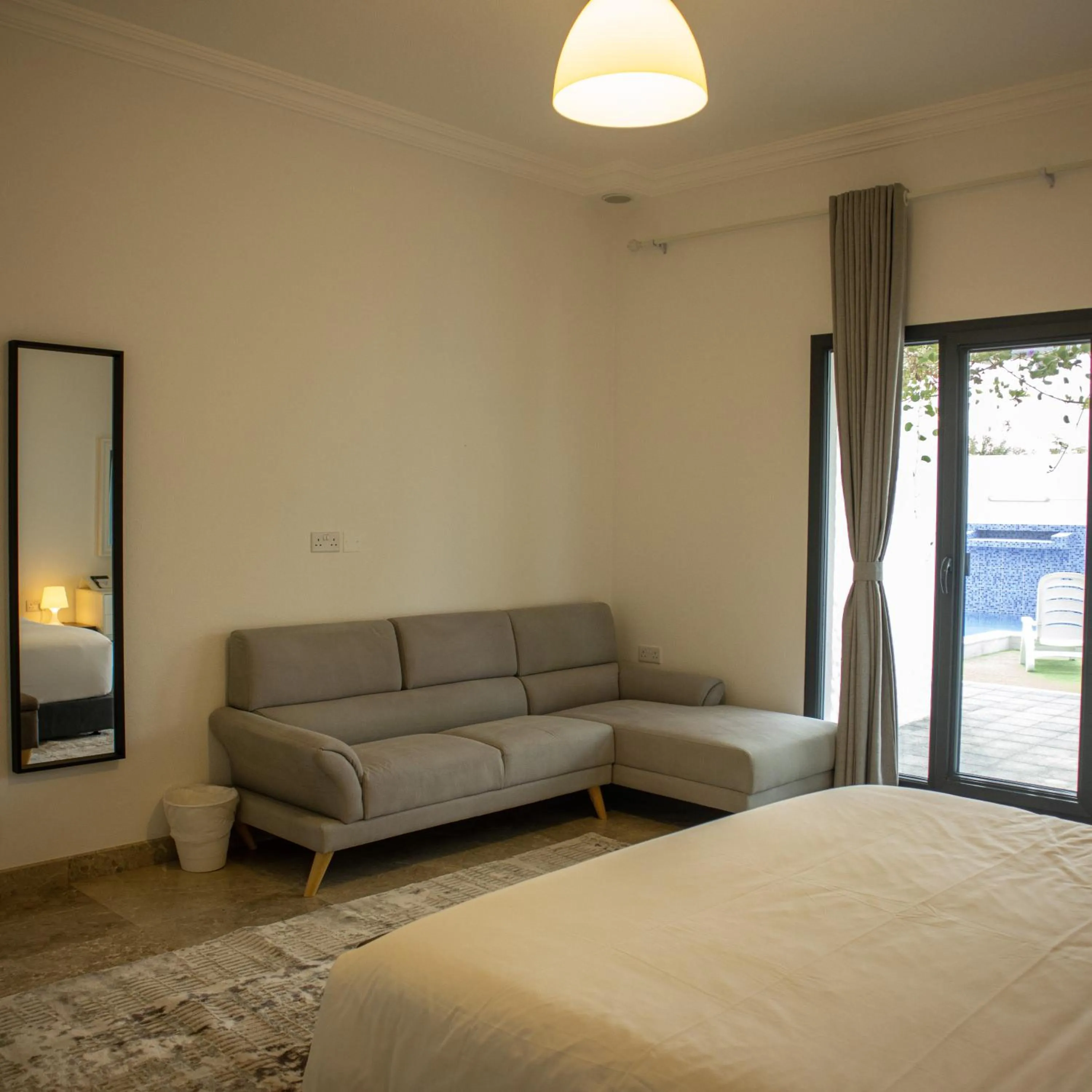 Garden view, Bed in THE POOL VILLA - TANUF