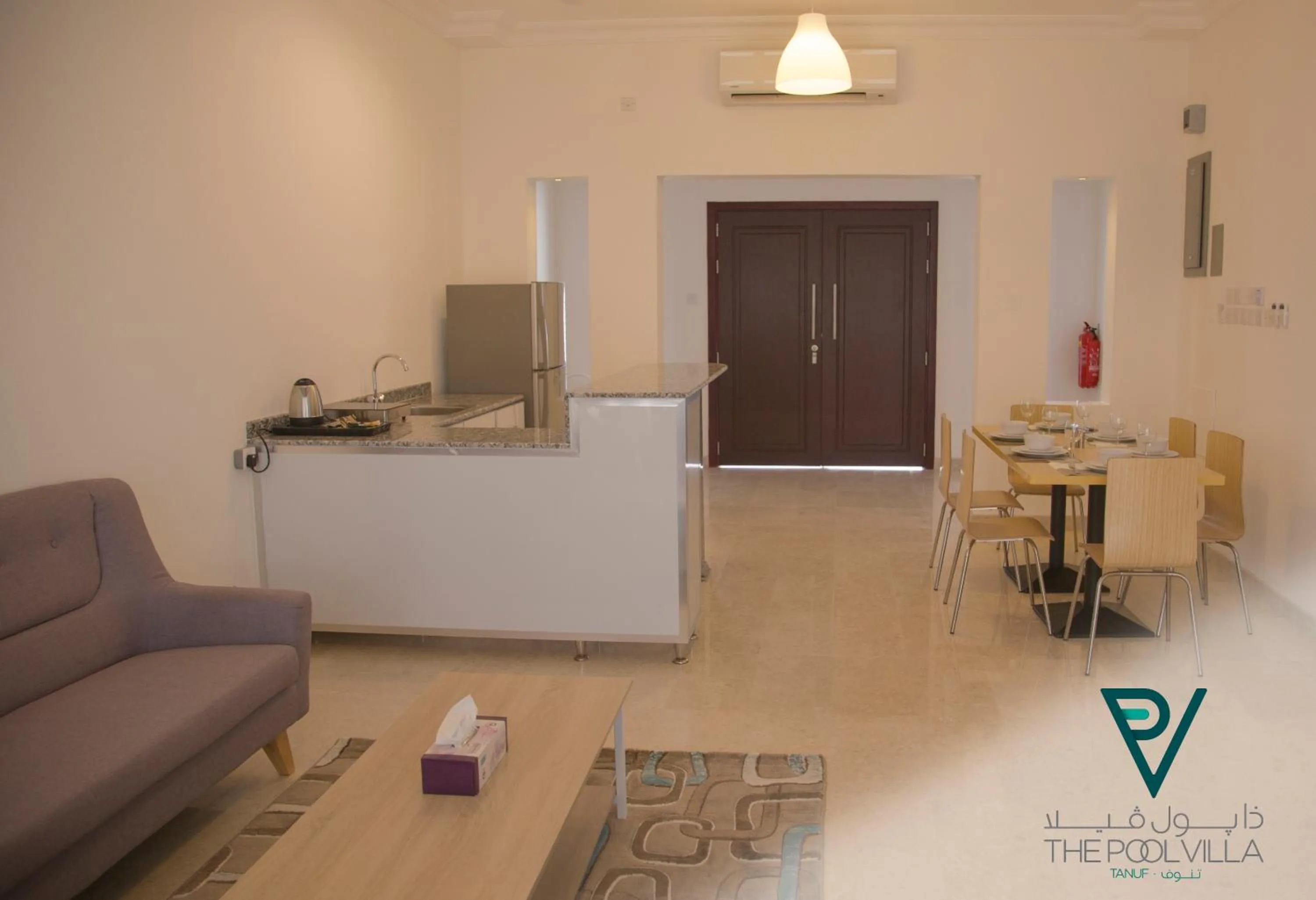 Communal lounge/ TV room in THE POOL VILLA - TANUF