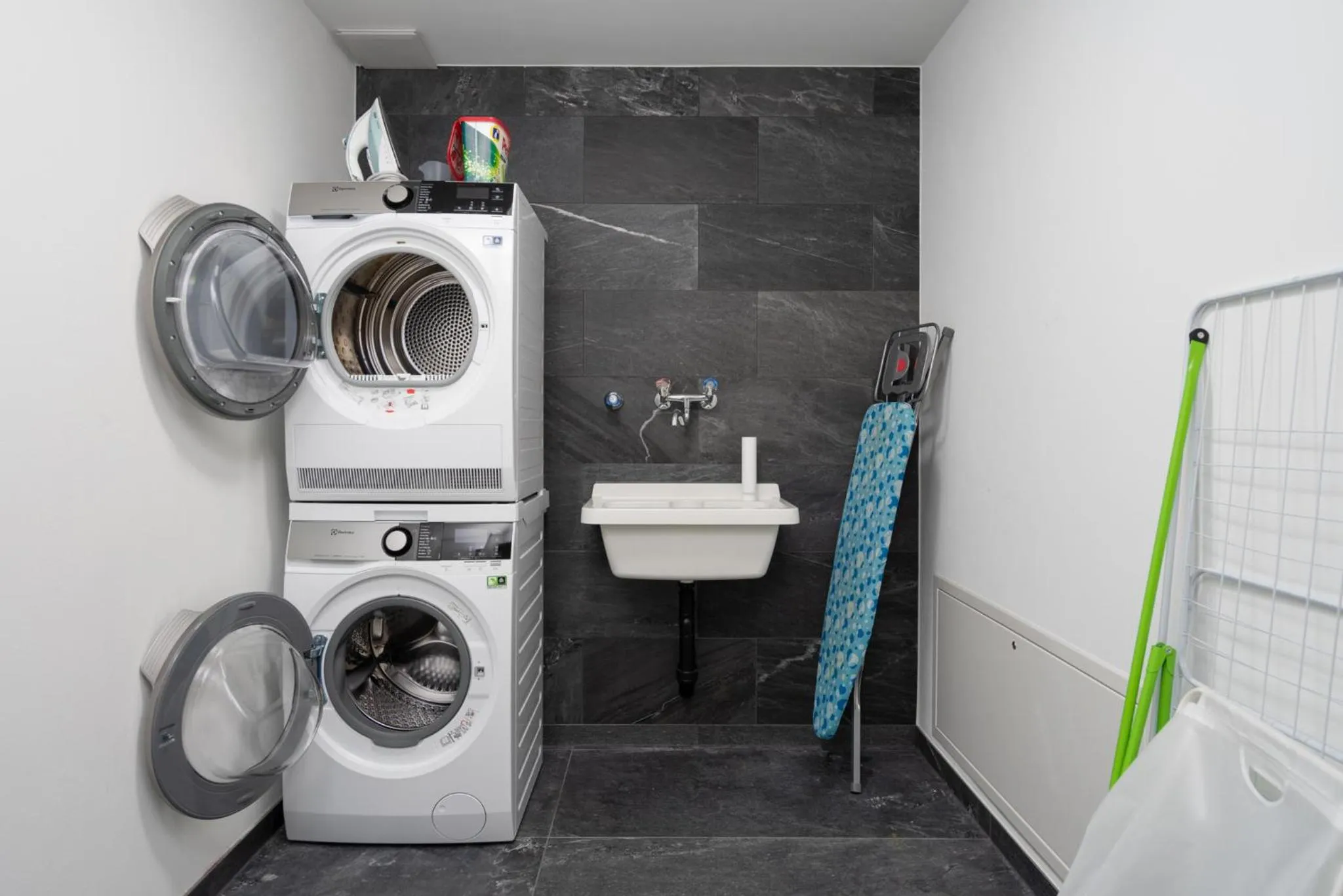 washing machine in Swiss Hotel Apartments - Interlaken