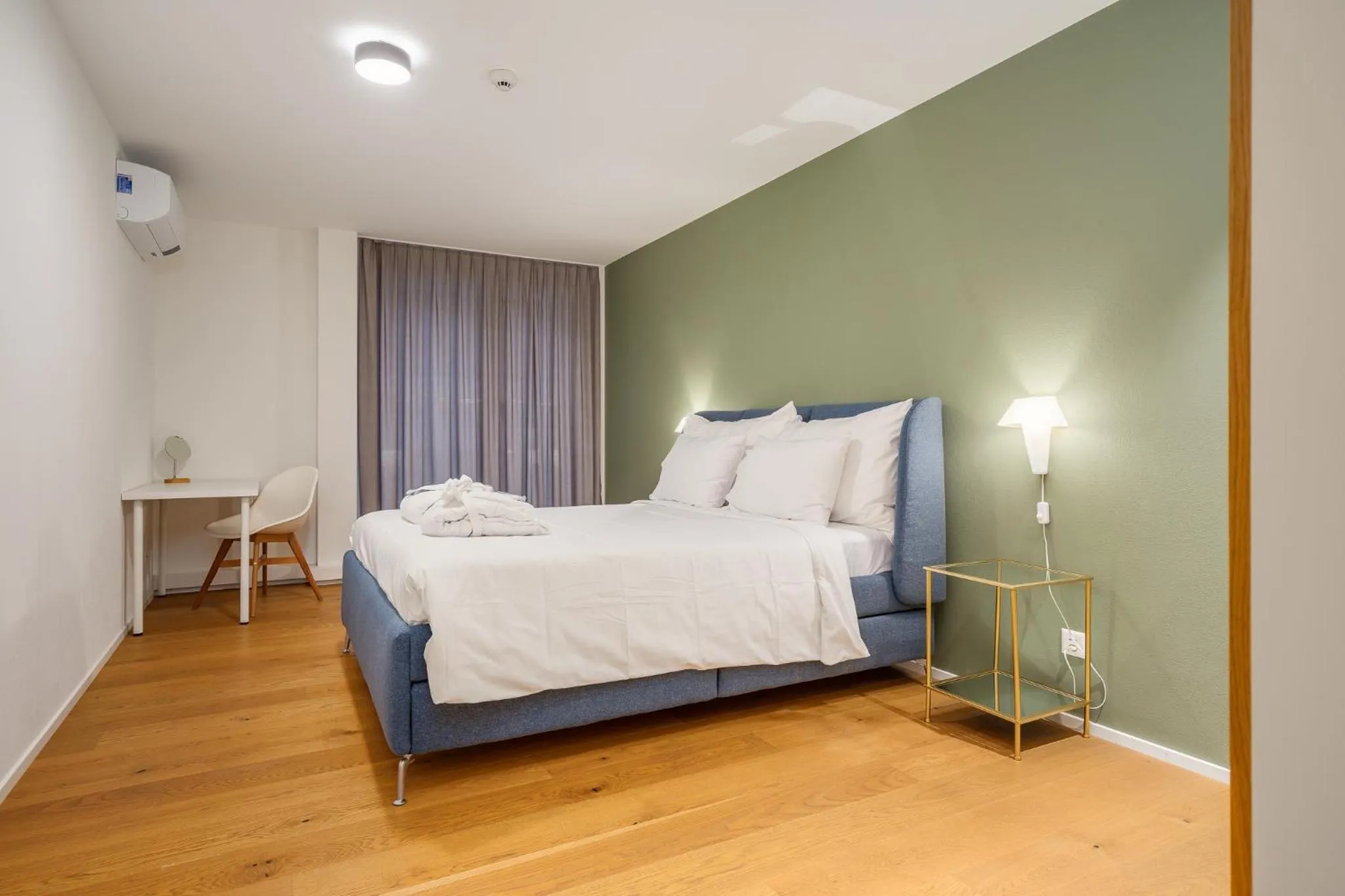 Bed in Swiss Hotel Apartments - Interlaken