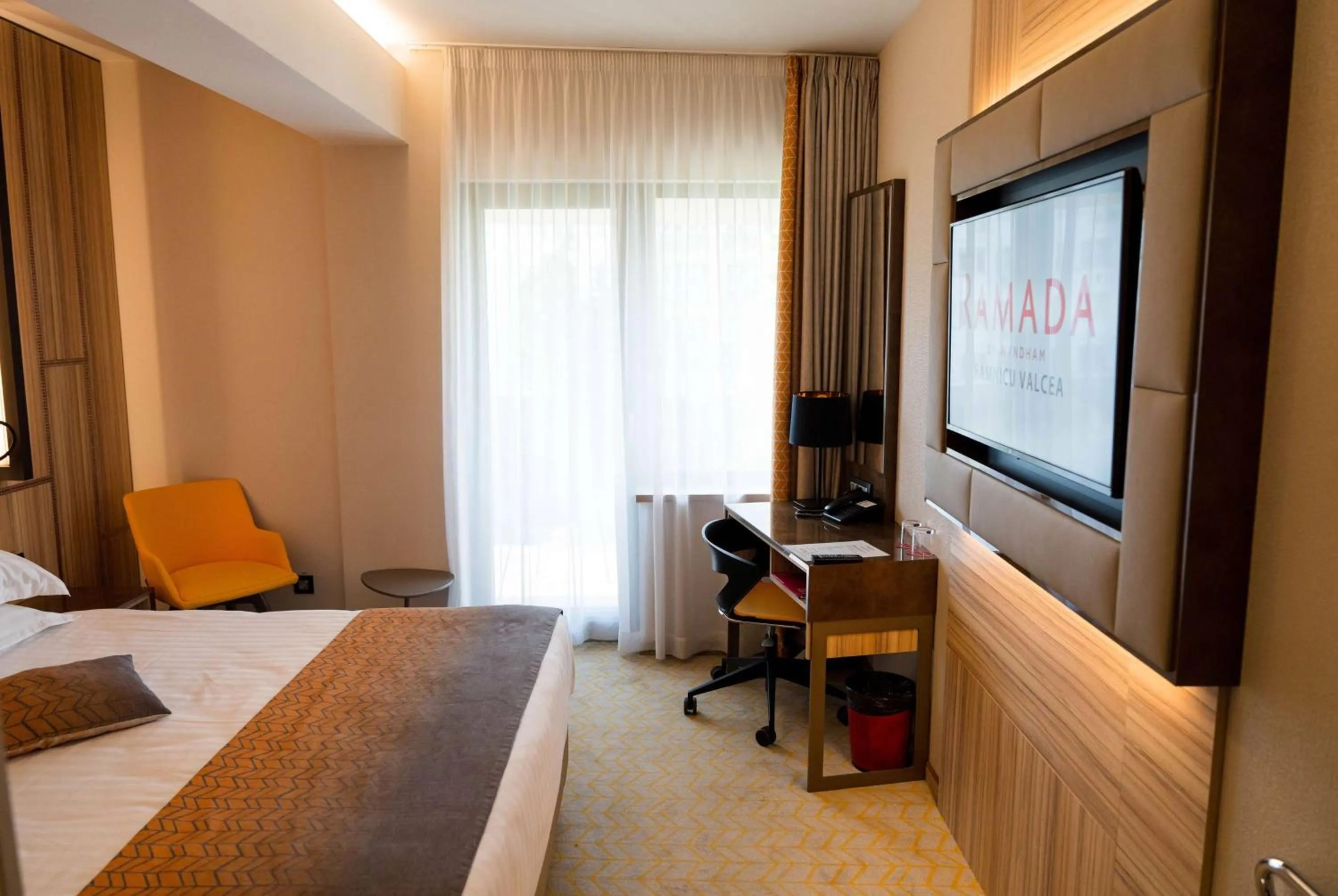 Photo of the whole room, Bed in Ramada by Wyndham Ramnicu Valcea