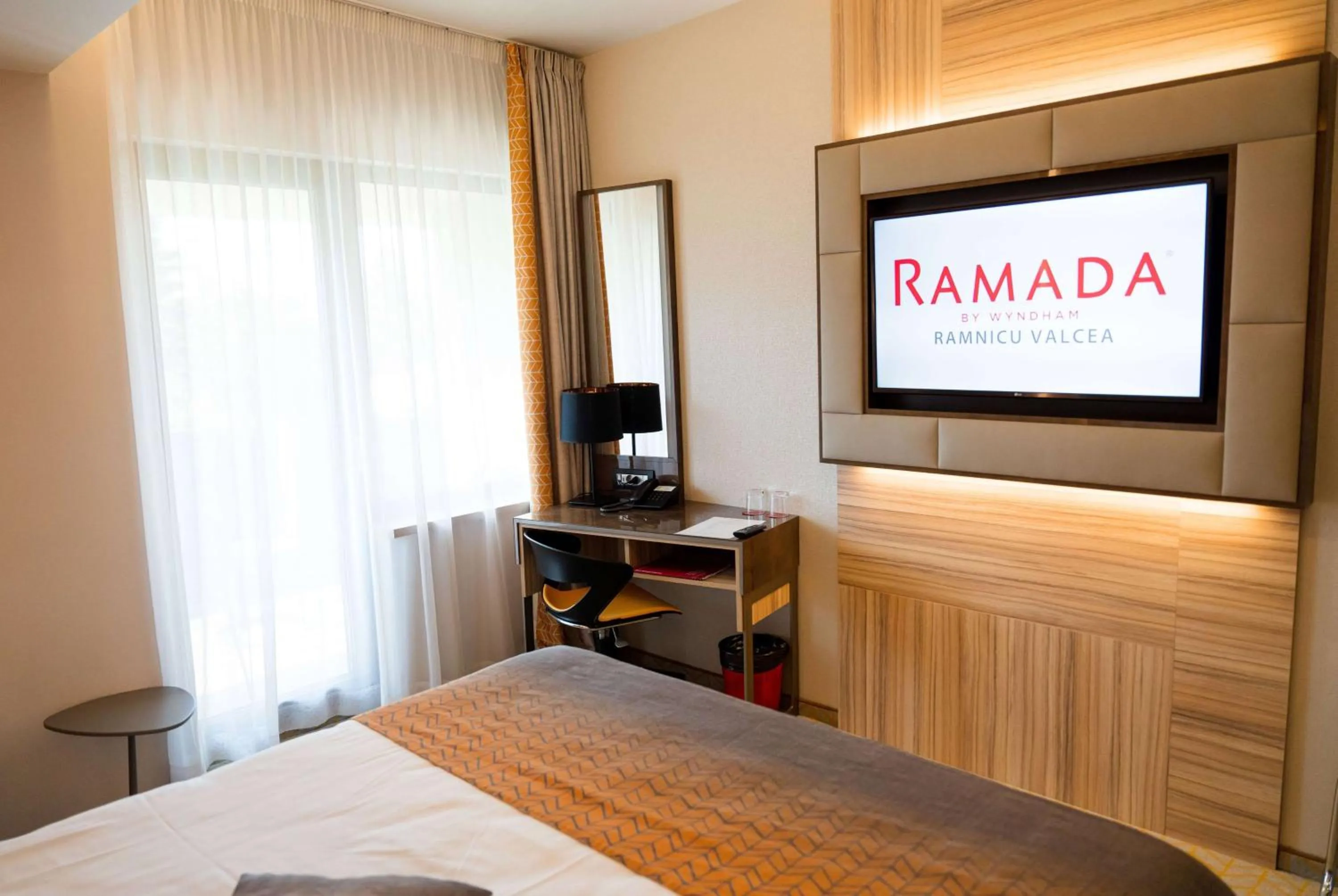 Photo of the whole room, Bed in Ramada by Wyndham Ramnicu Valcea