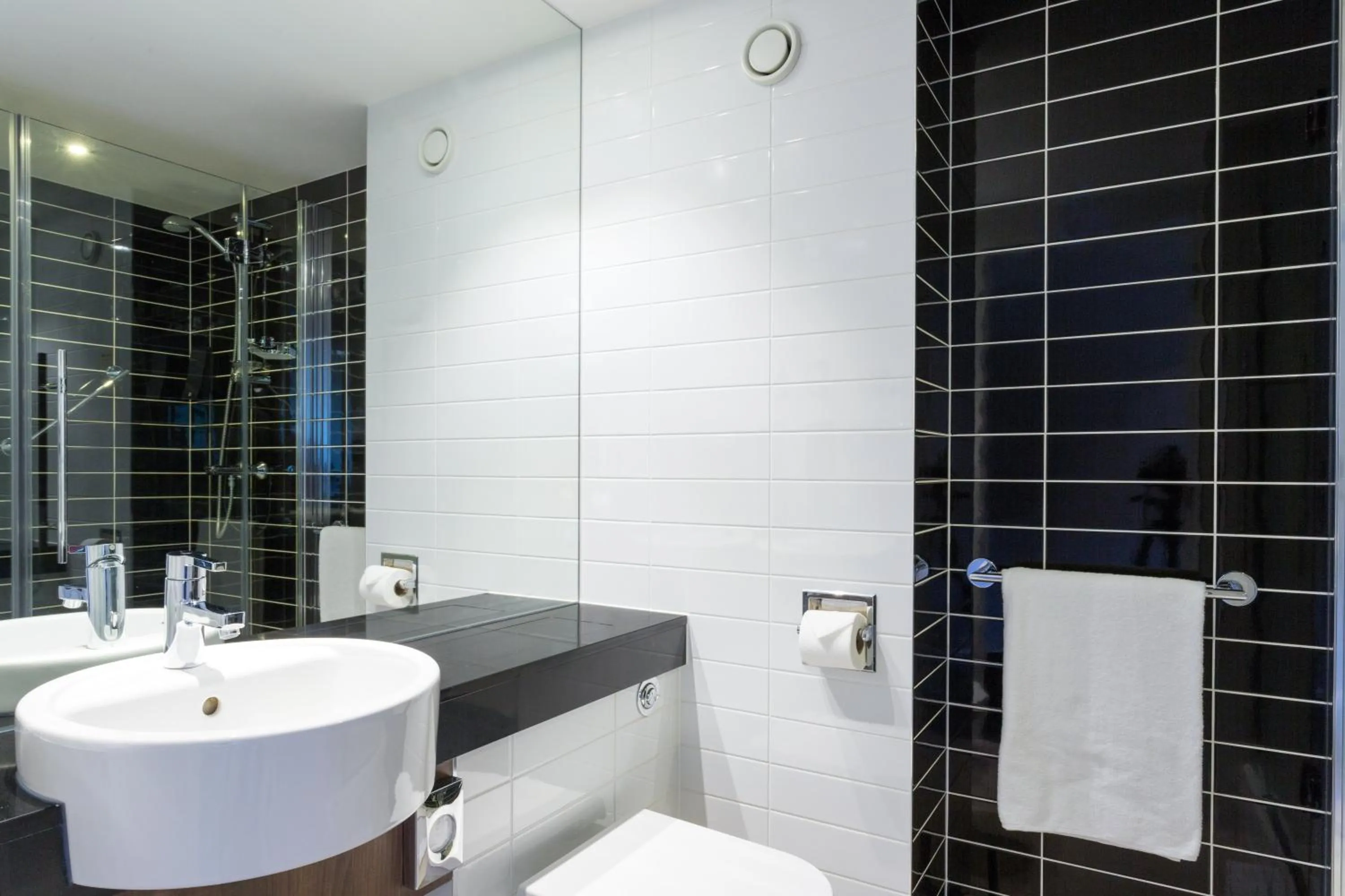 Bathroom in Holiday Inn Express Harlow by IHG