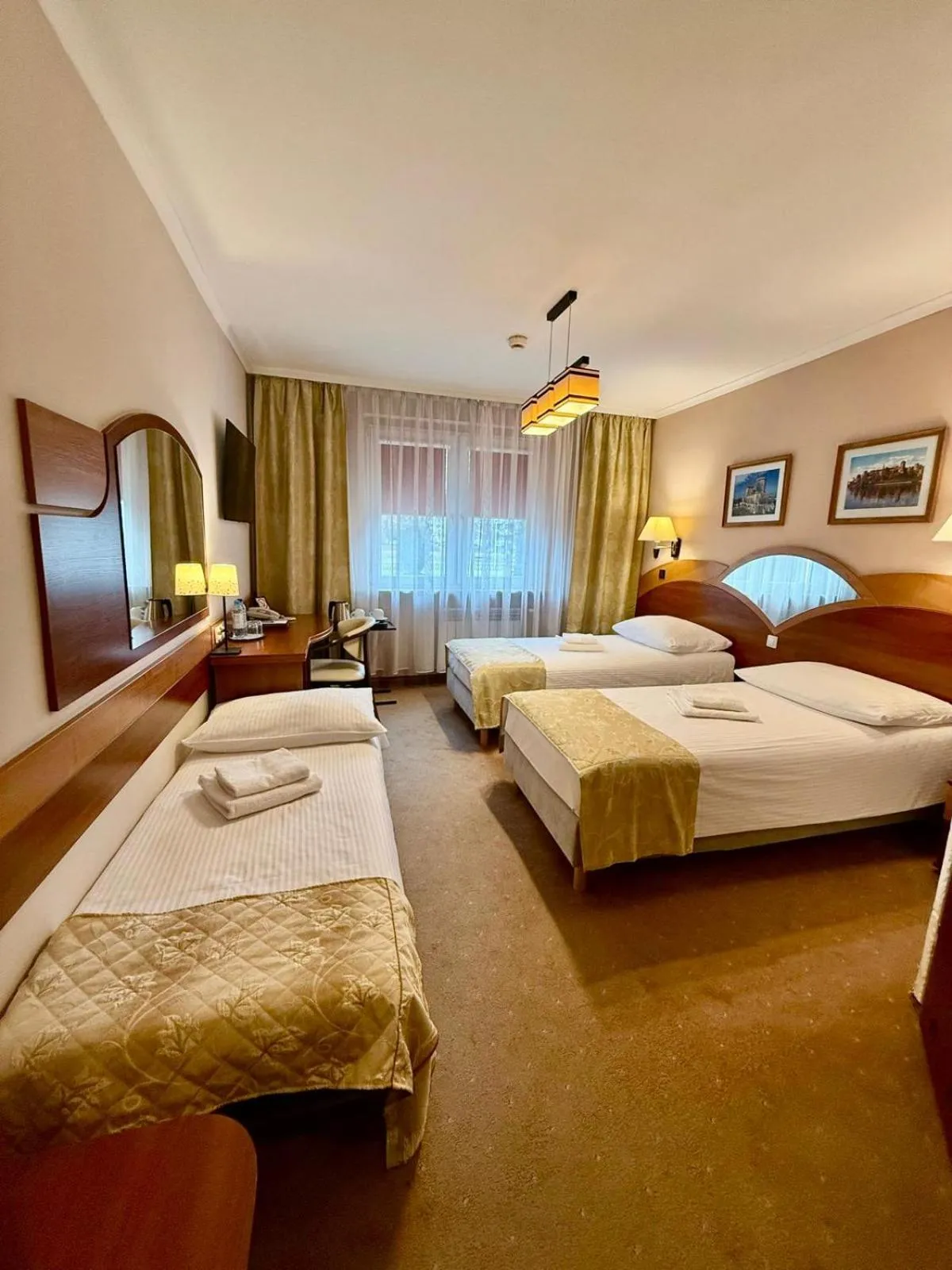 Bed in Cumulus Hotel