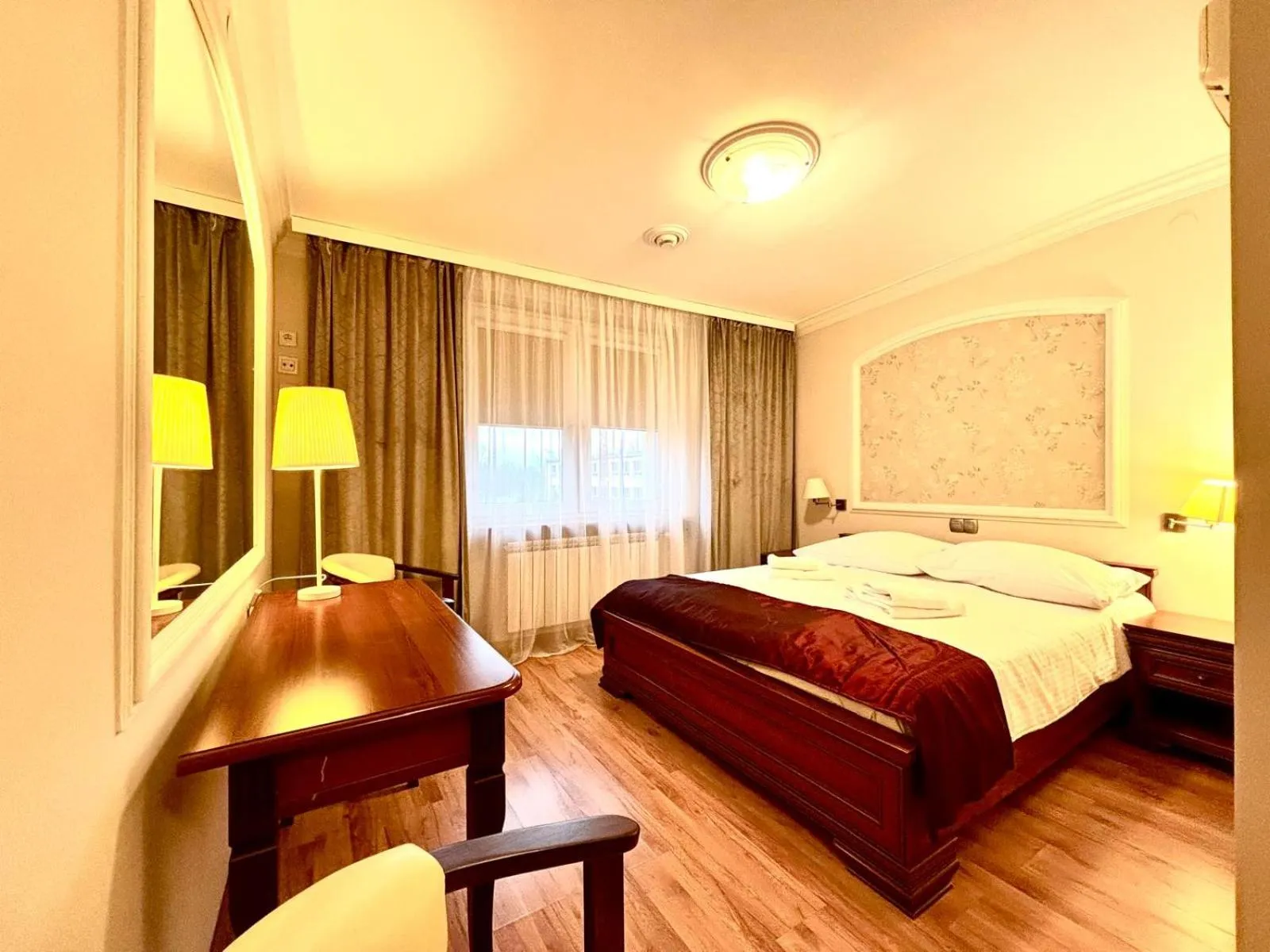 Bed in Cumulus Hotel