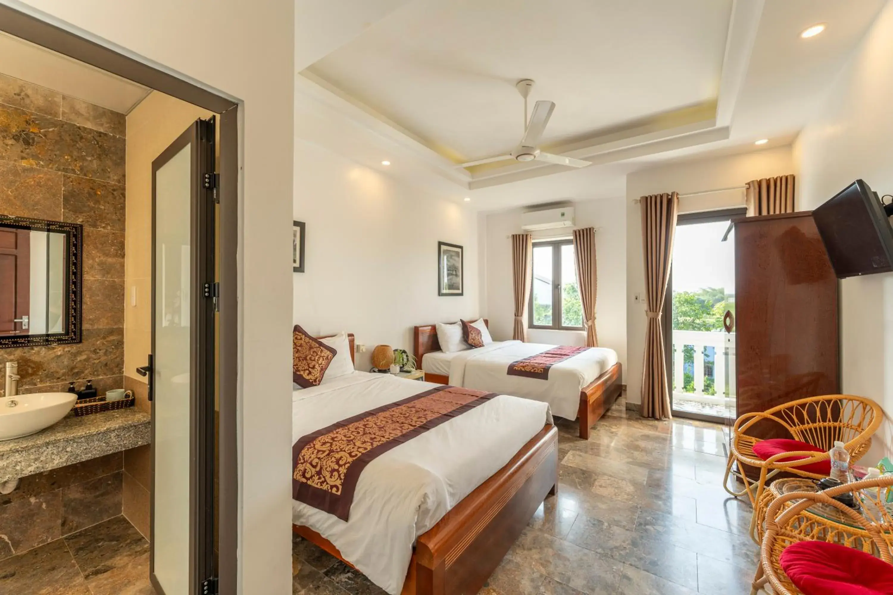 Family Room with Balcony in Rice River Villa - Hoi An Family Room with Balcony in Rice River Villa - Hoi An