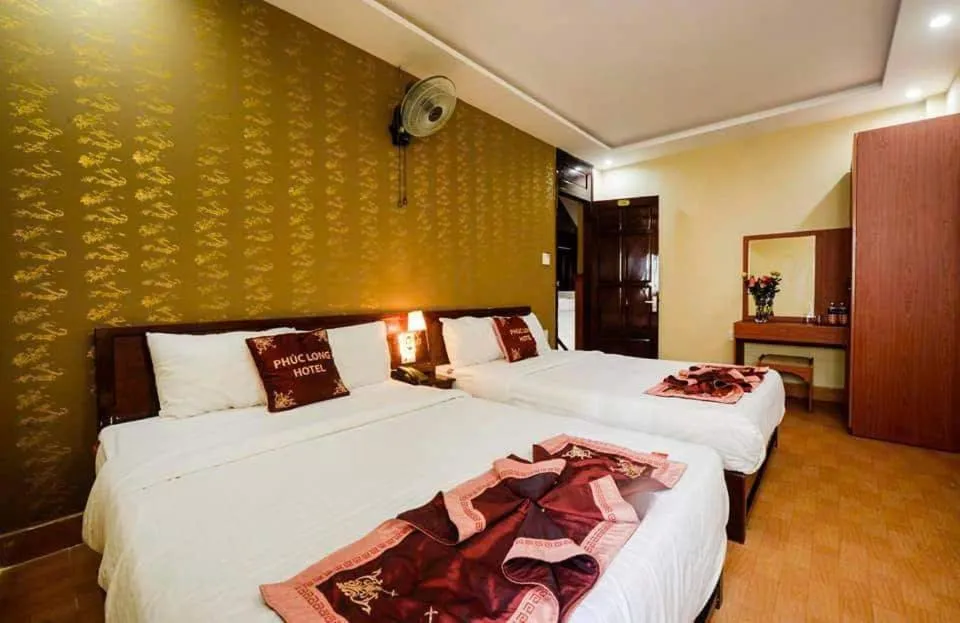 Bed in Phuc Long Hotel