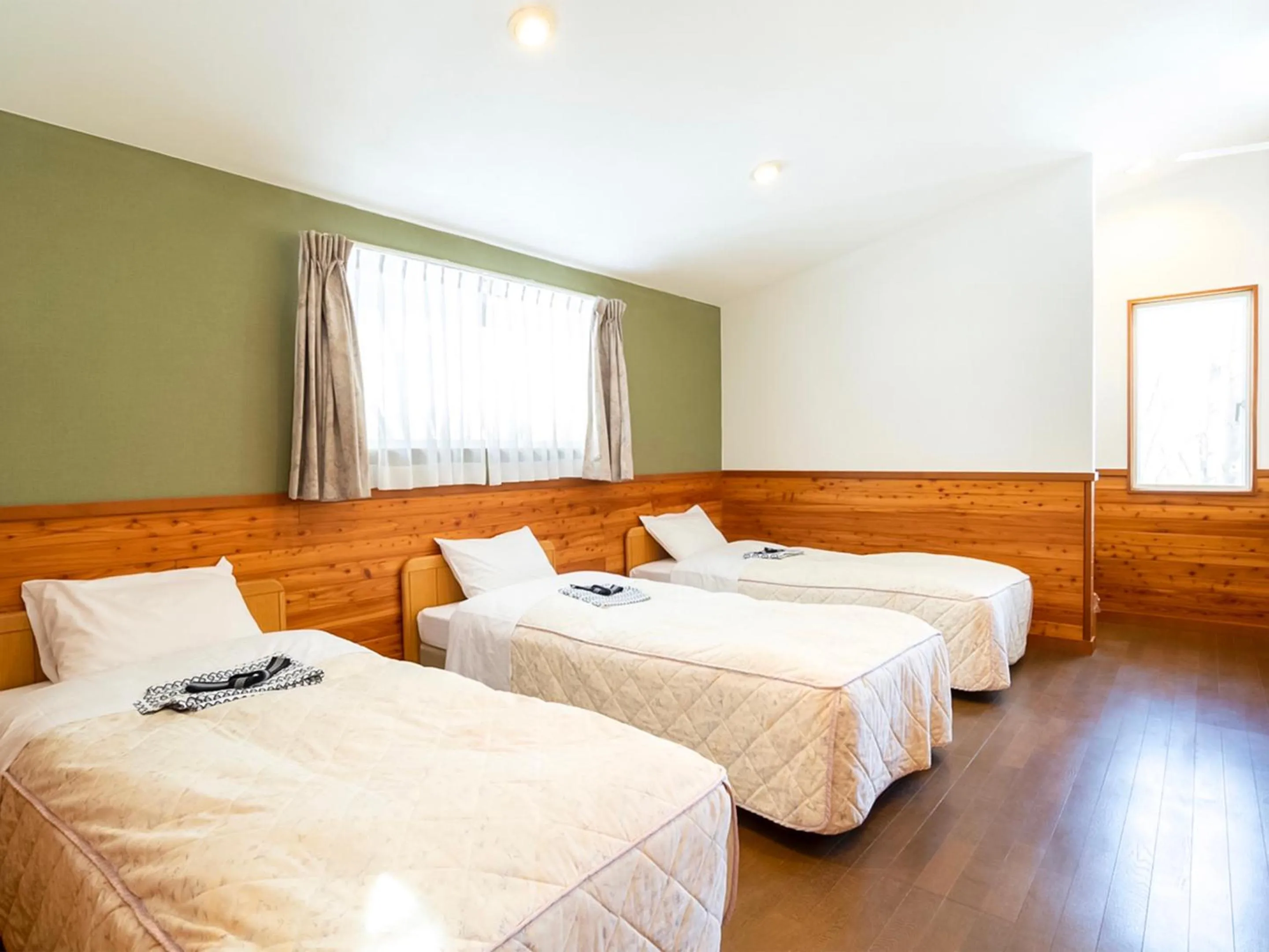 Bedroom, Bed in HOLIDAY VILLA Hotel & Resort KARUIZAWA