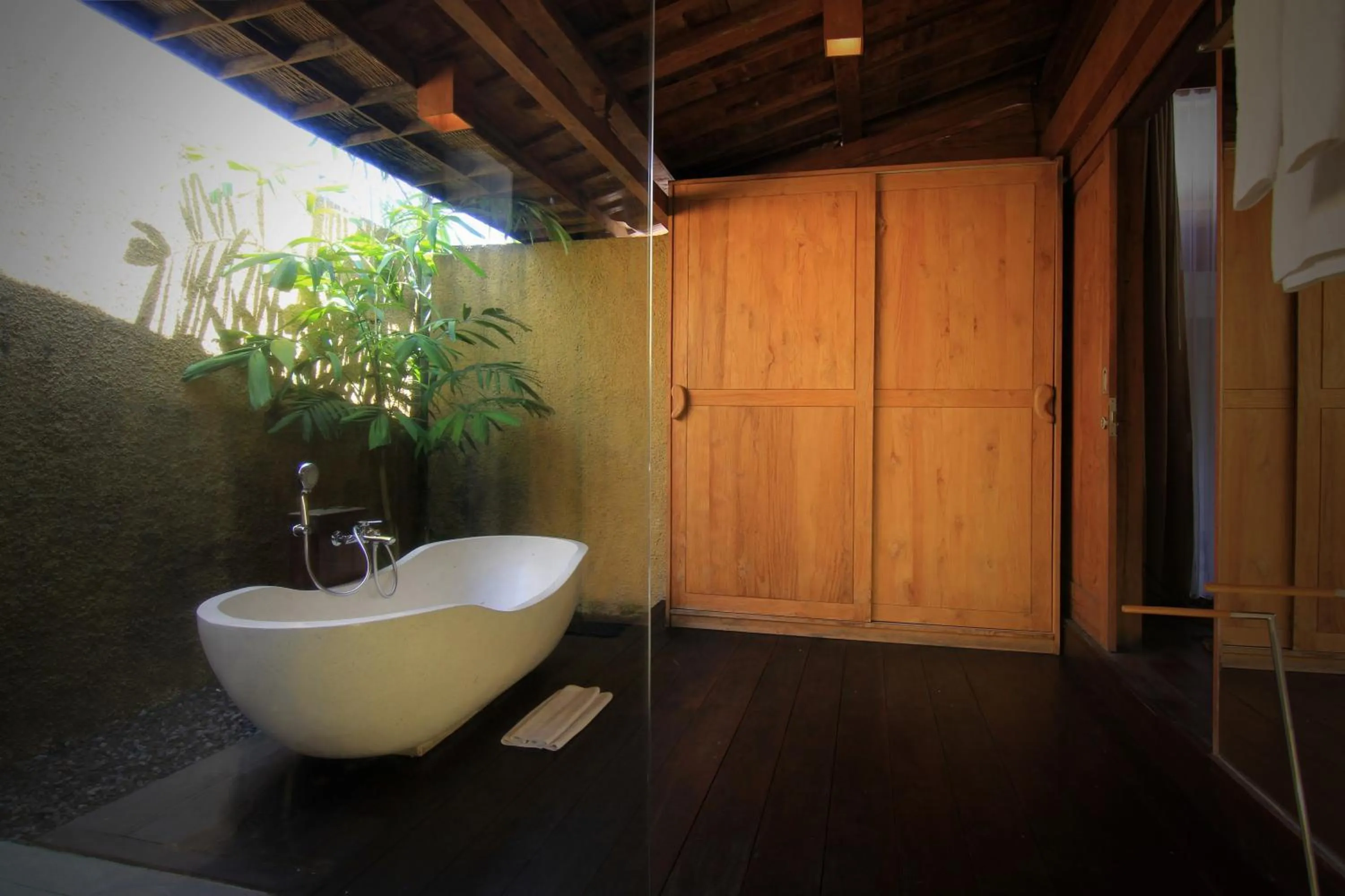Bathroom in Taulan Villa by Social Hideout