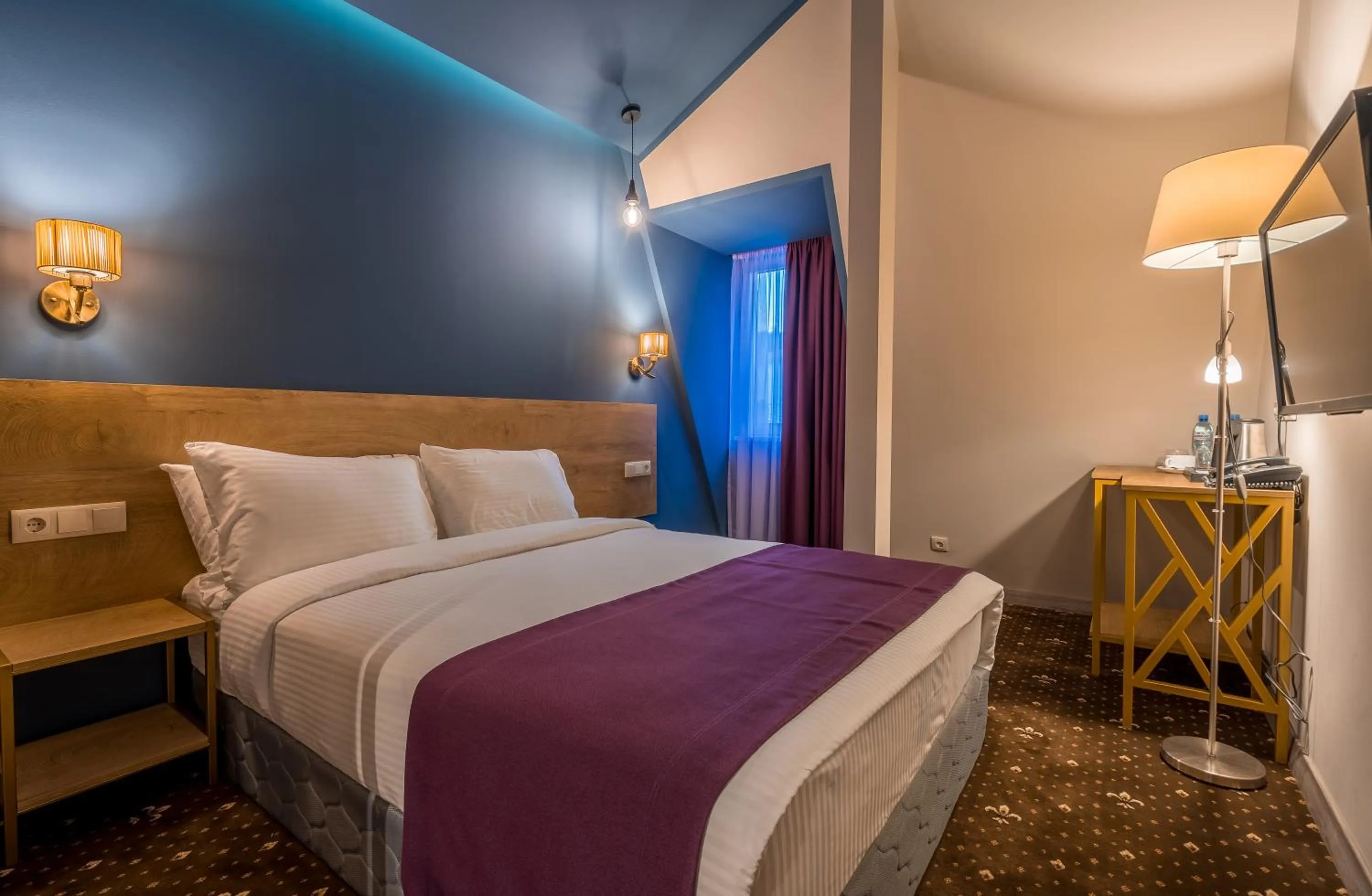 Bed in Gladius Inn Boutique Hotel by DNT Group