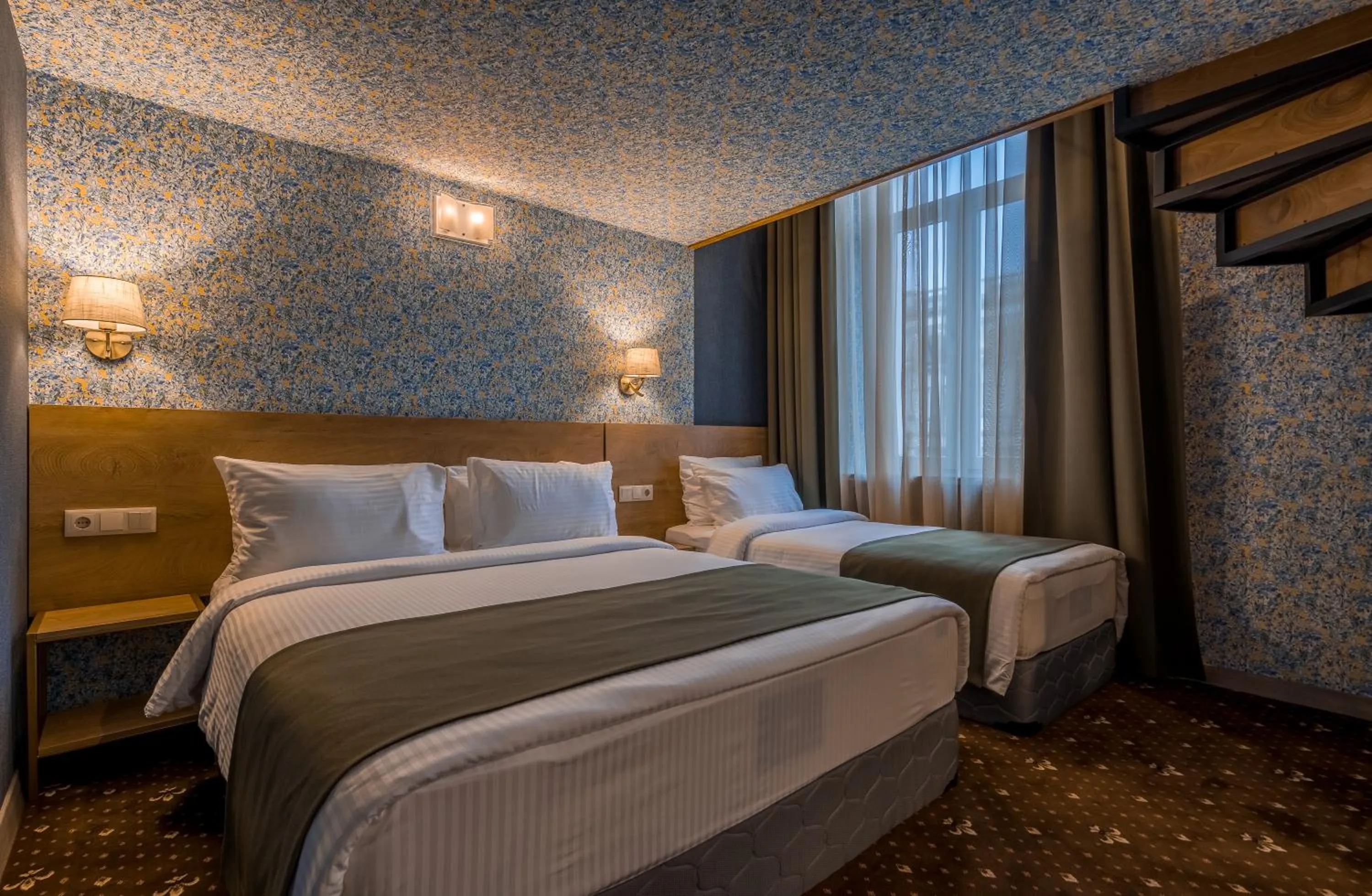 Bed in Gladius Inn Boutique Hotel by DNT Group