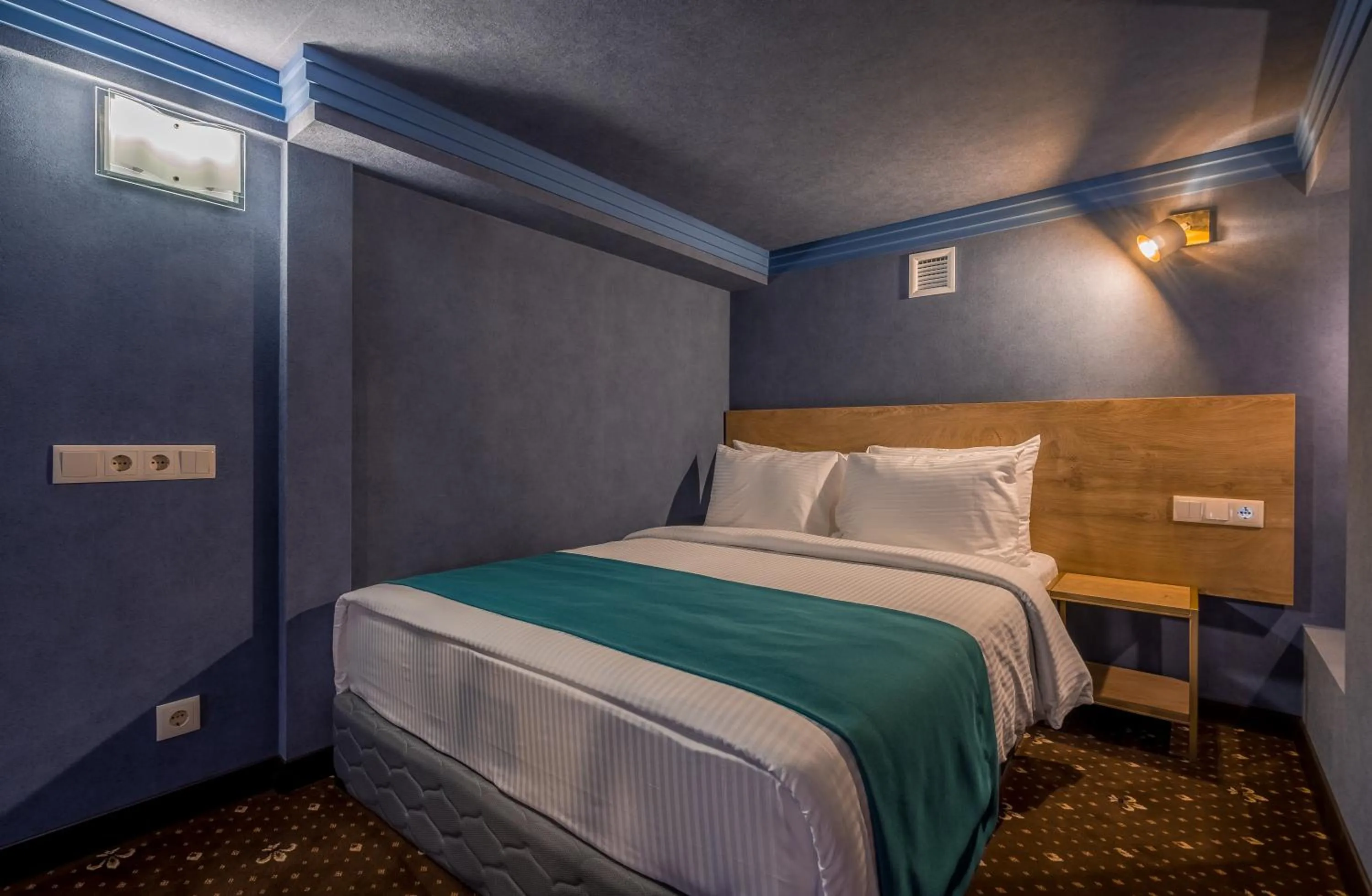 Bed in Gladius Inn Boutique Hotel by DNT Group