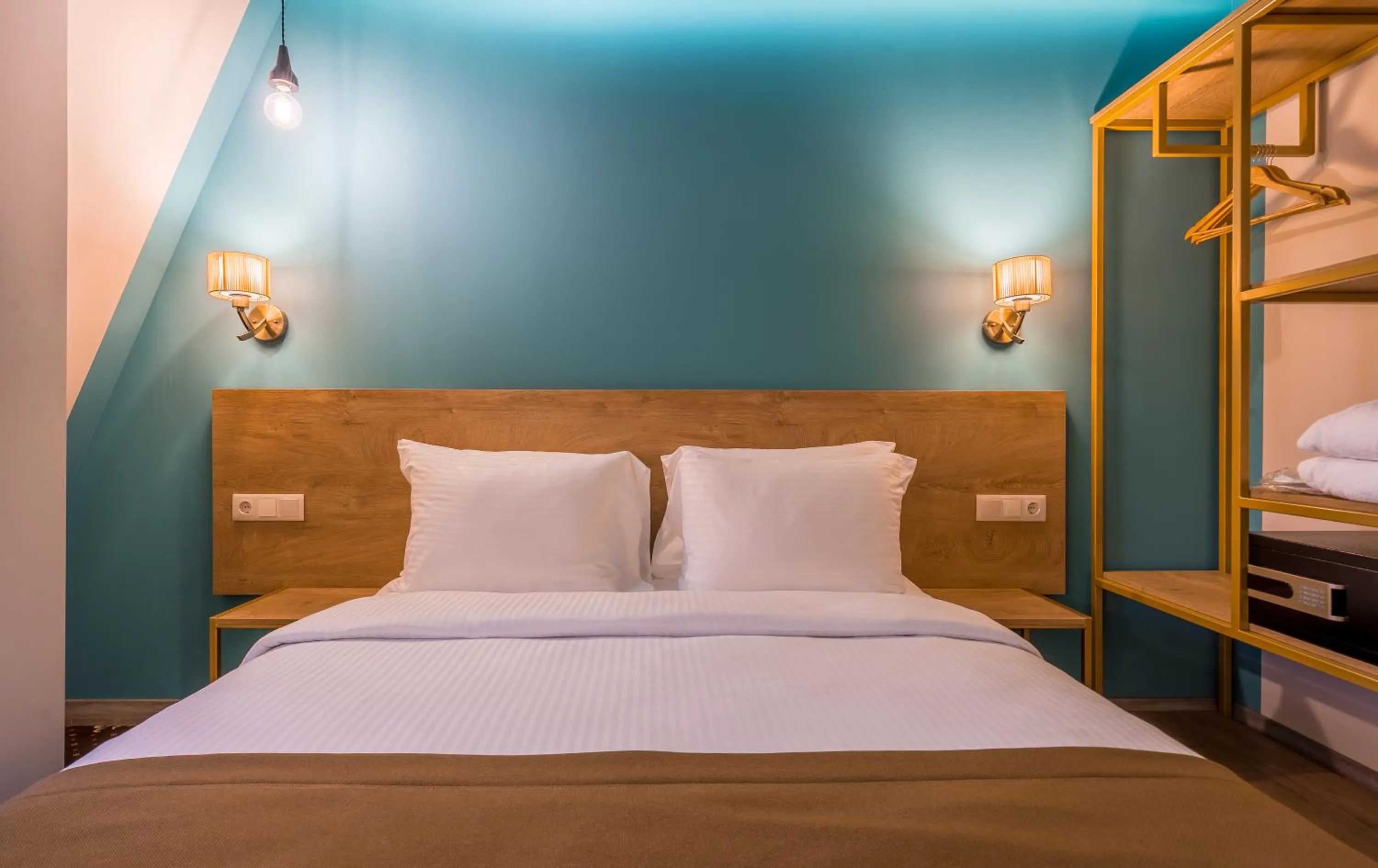 Bed in Gladius Inn Boutique Hotel by DNT Group