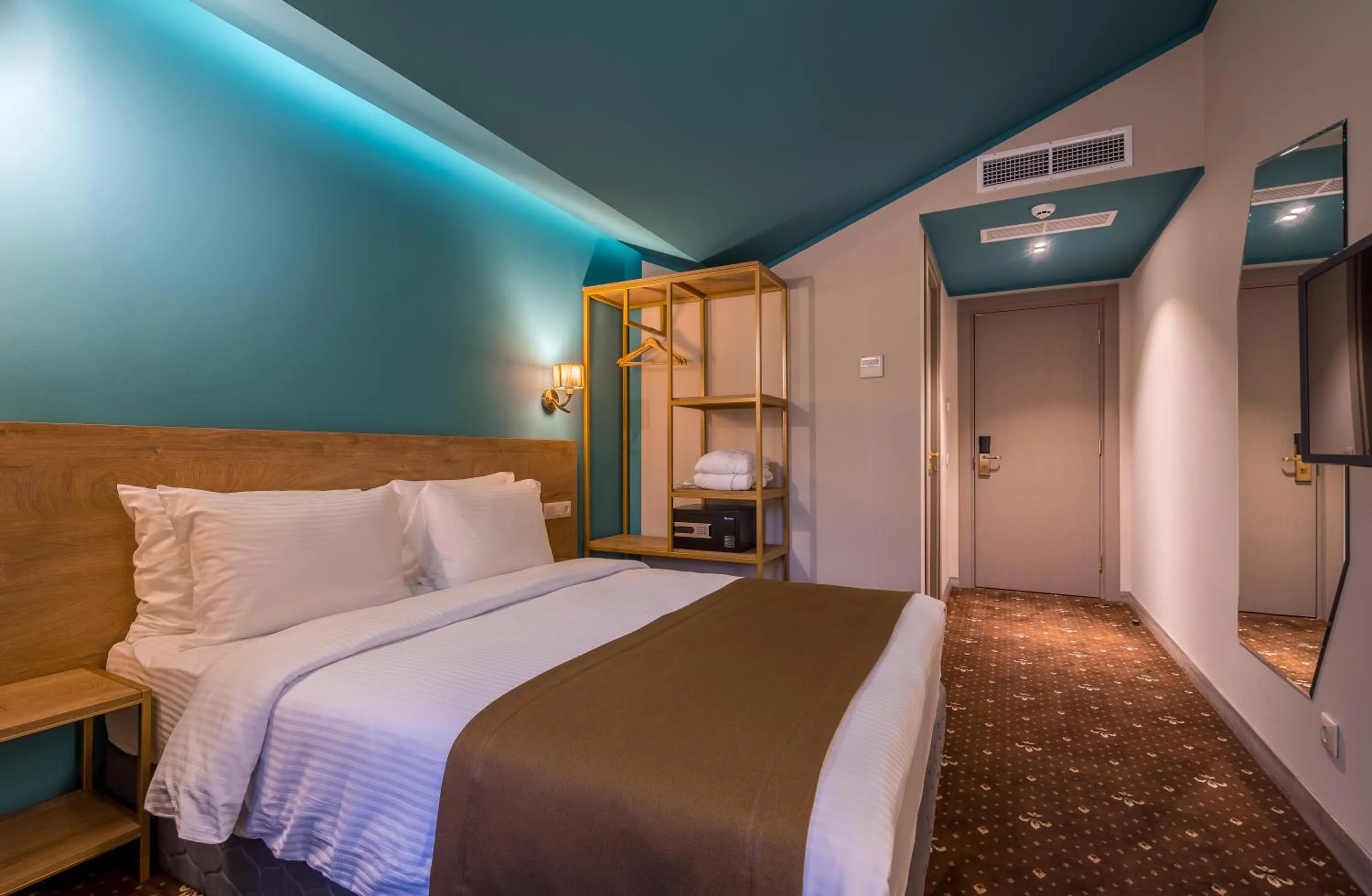 Bed in Gladius Inn Boutique Hotel by DNT Group