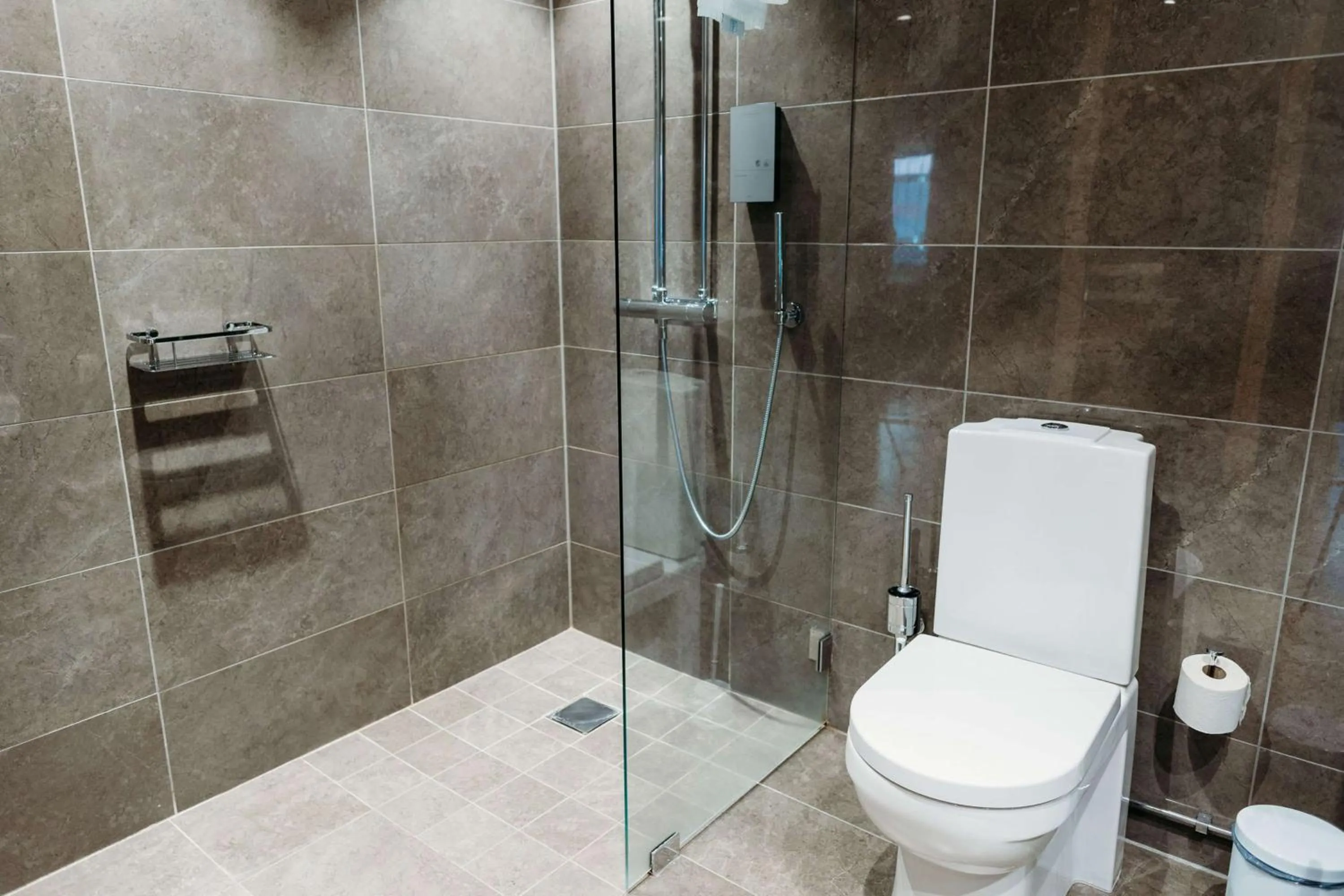 Bathroom in Vimmerby Stadshotell, WorldHotels Crafted