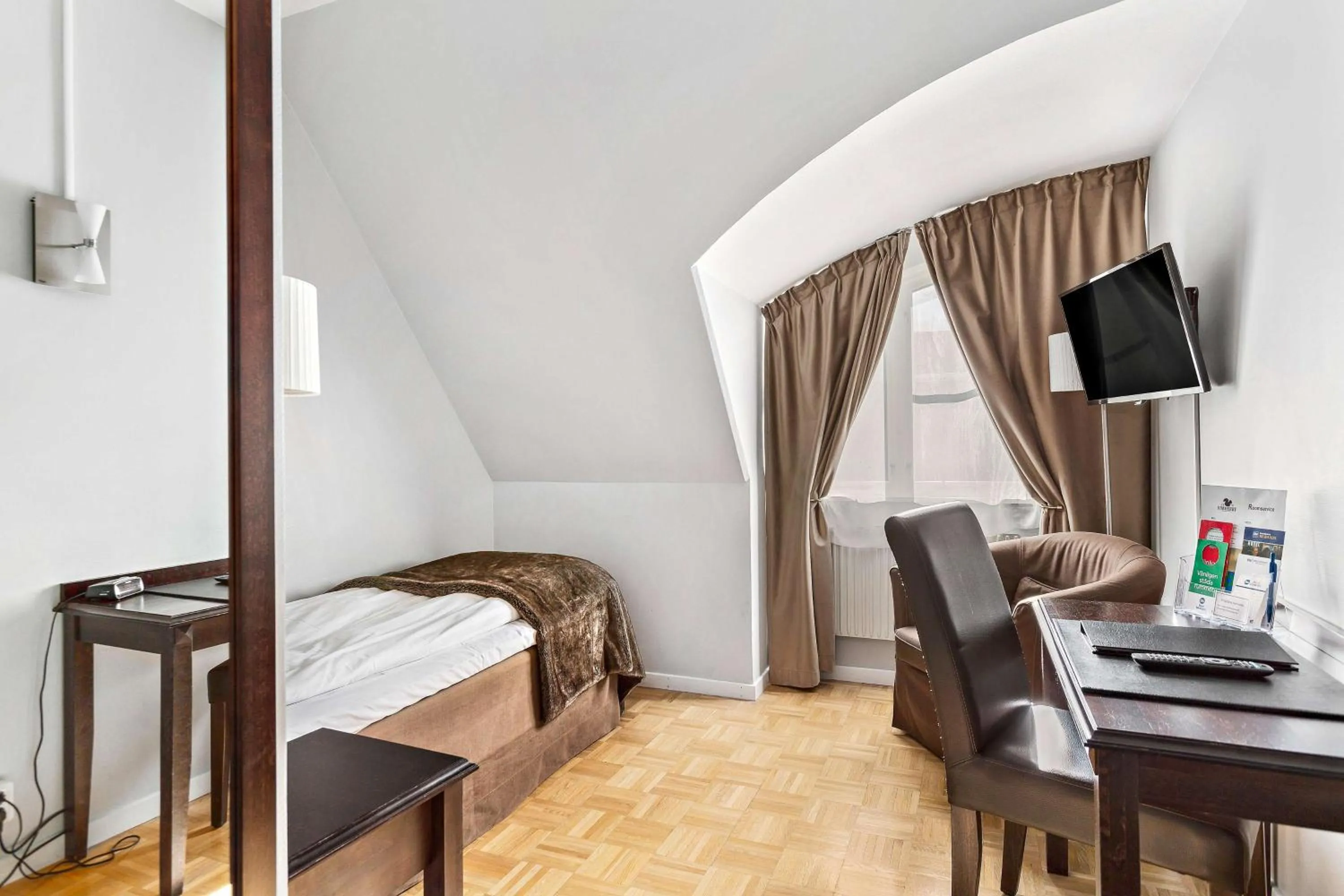 Bedroom, Bed in Vimmerby Stadshotell, WorldHotels Crafted