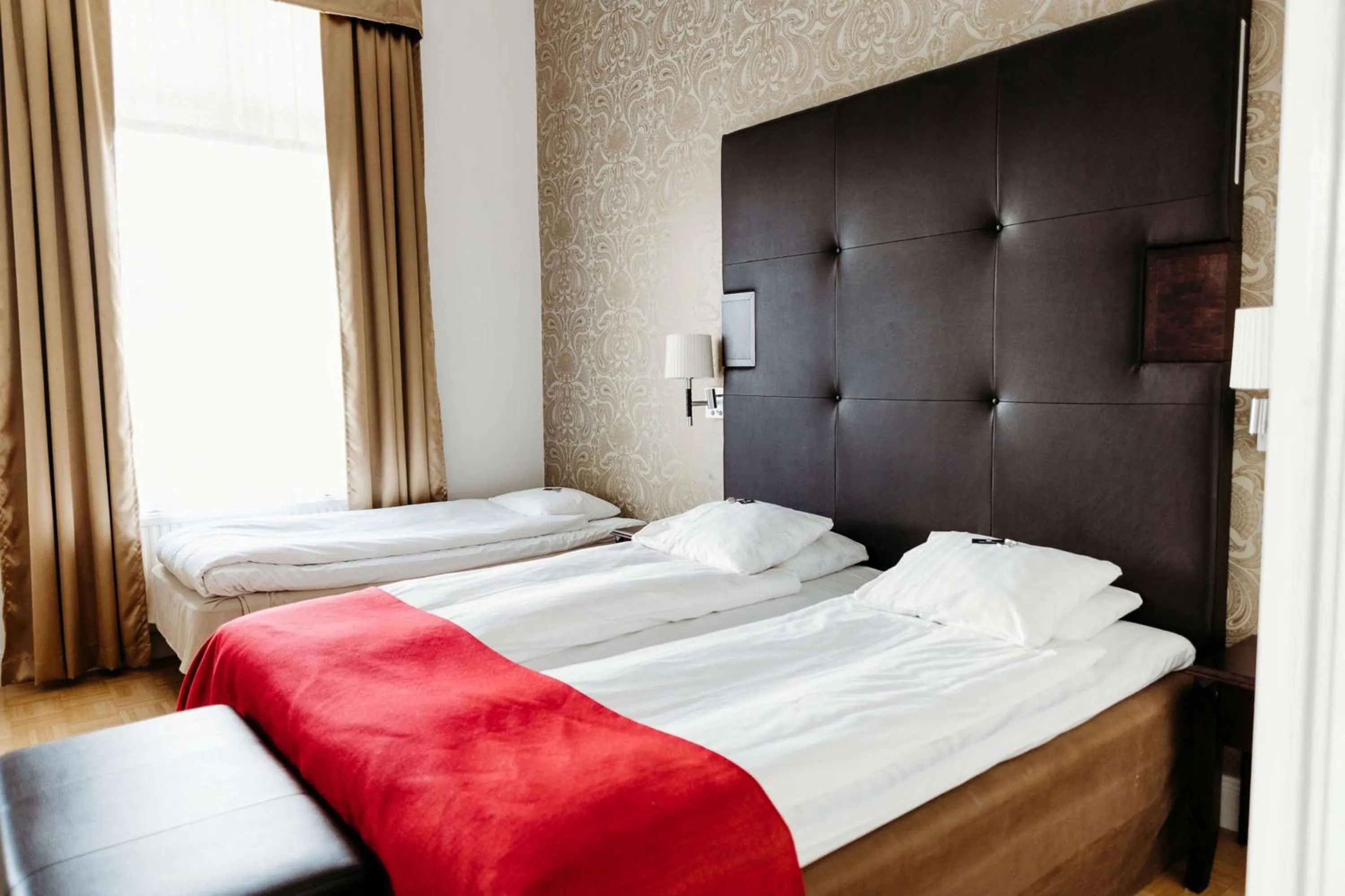 Bedroom, Bed in Vimmerby Stadshotell, WorldHotels Crafted