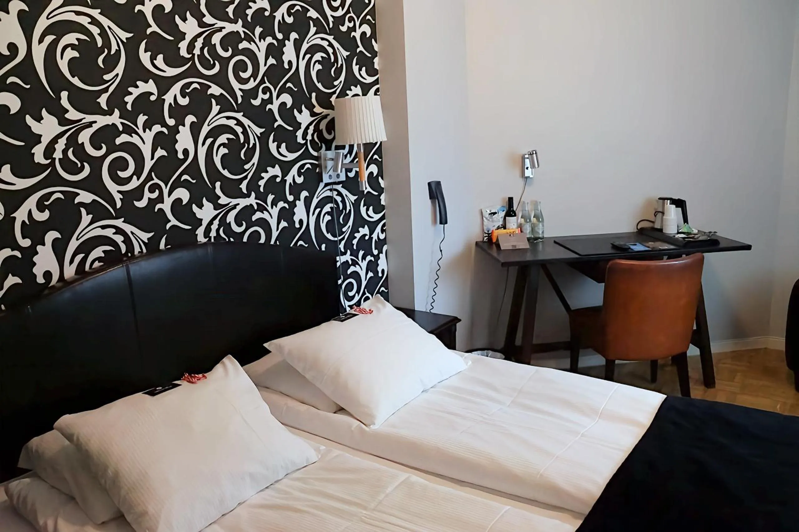 Bed in Vimmerby Stadshotell, WorldHotels Crafted
