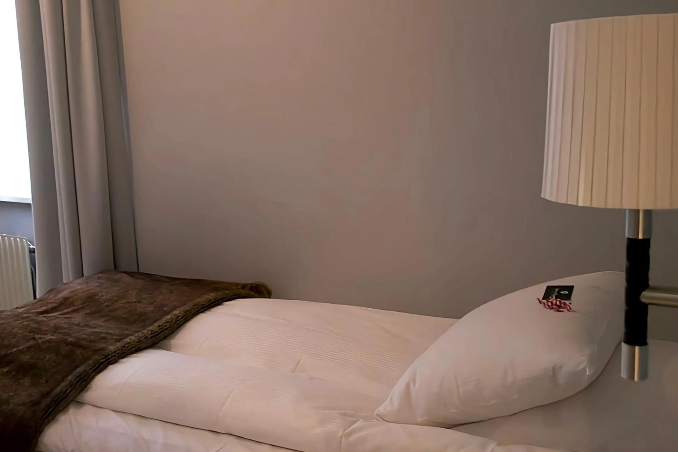 Bed in Vimmerby Stadshotell, WorldHotels Crafted