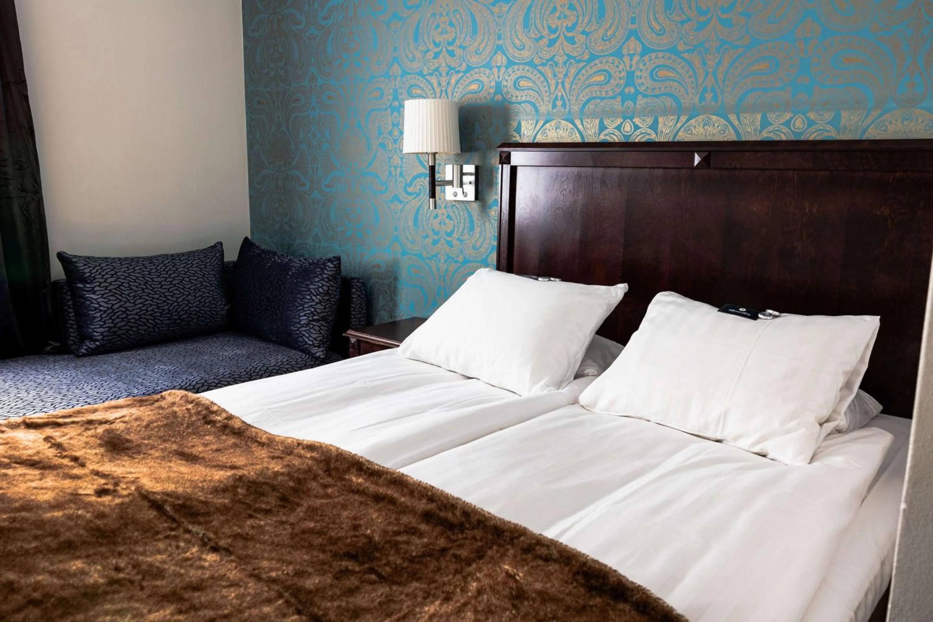 Bedroom, Bed in Vimmerby Stadshotell, WorldHotels Crafted