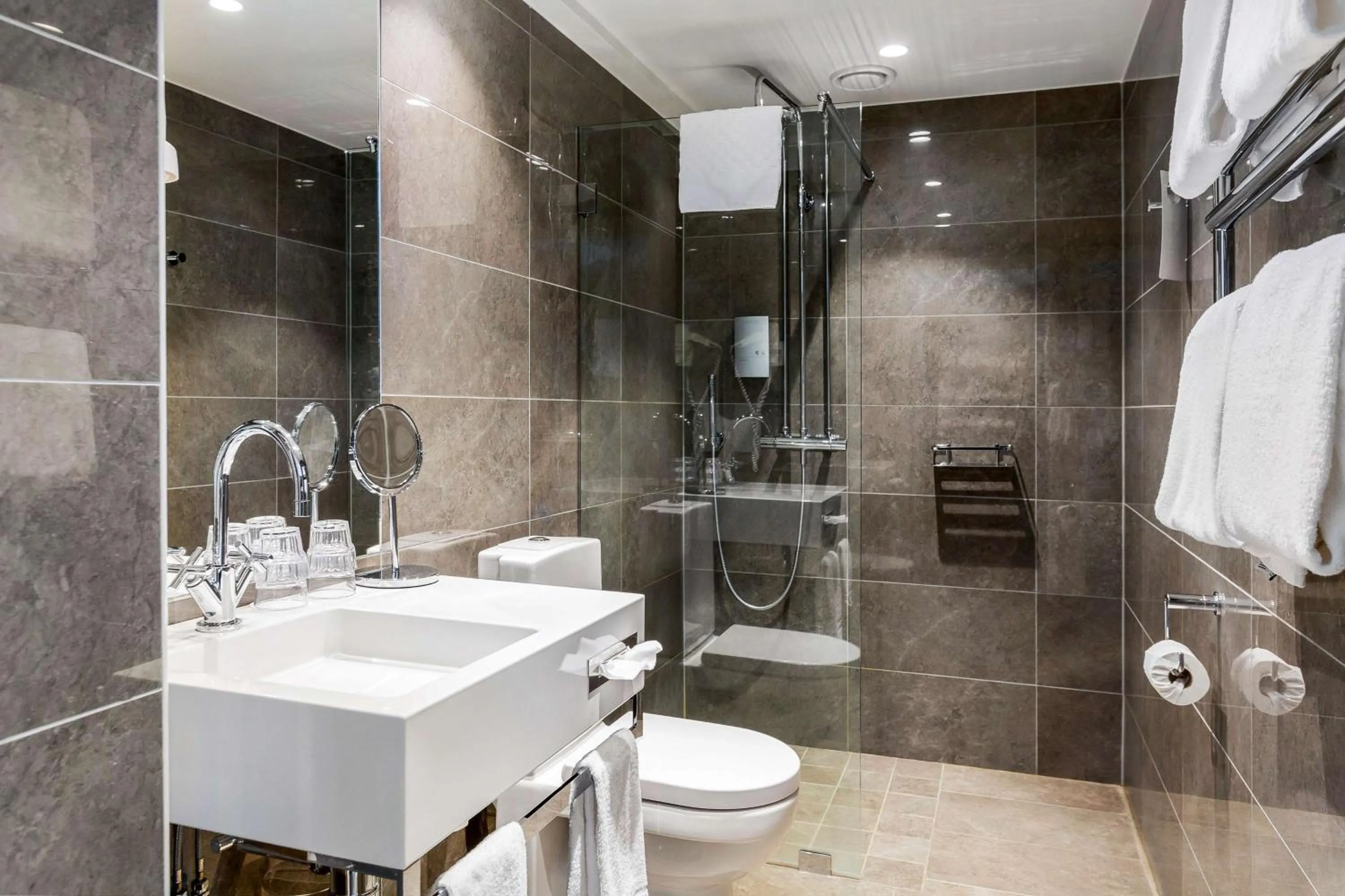 Bathroom in Vimmerby Stadshotell, WorldHotels Crafted