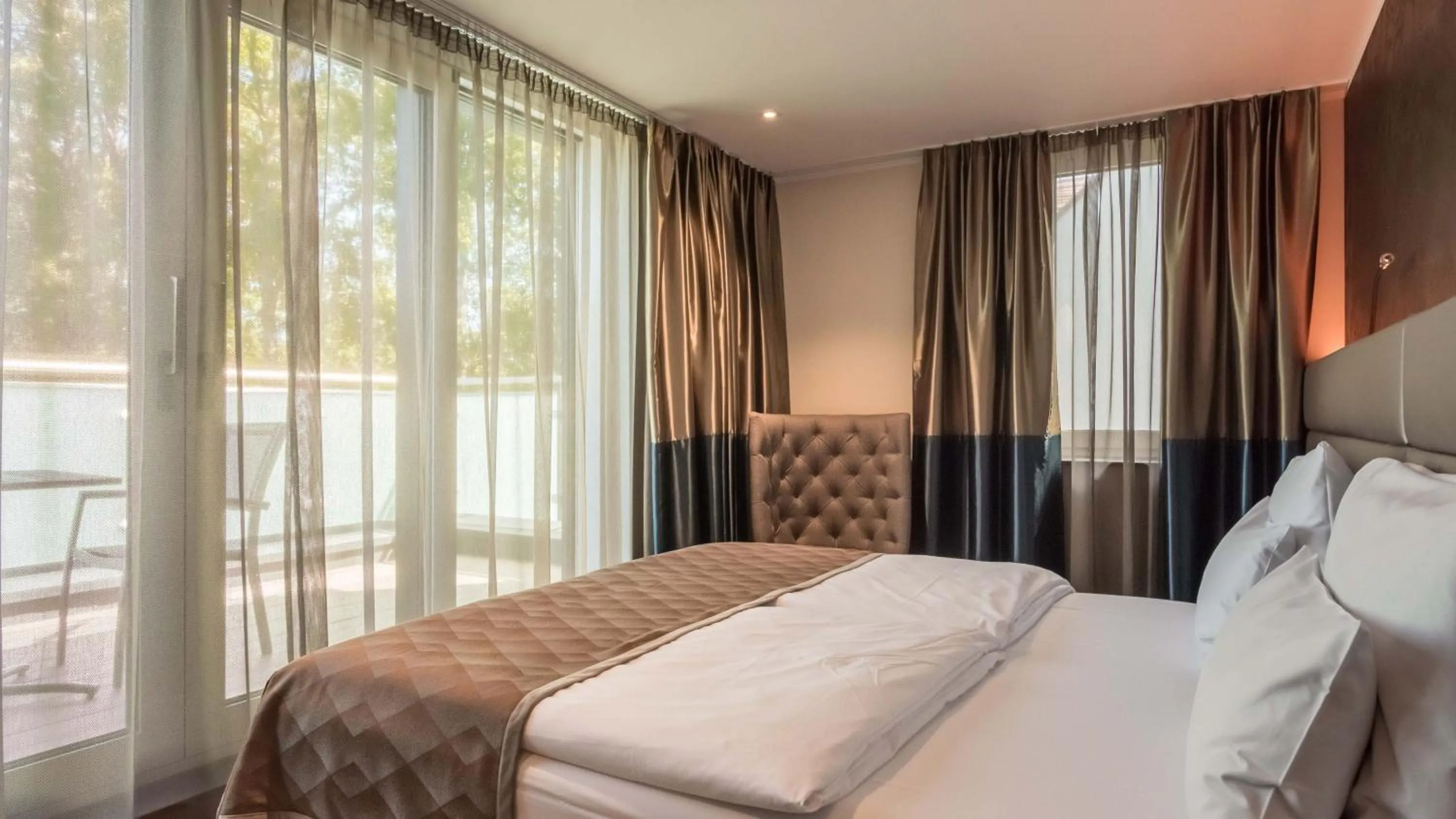 Bed in Innspire Hotel