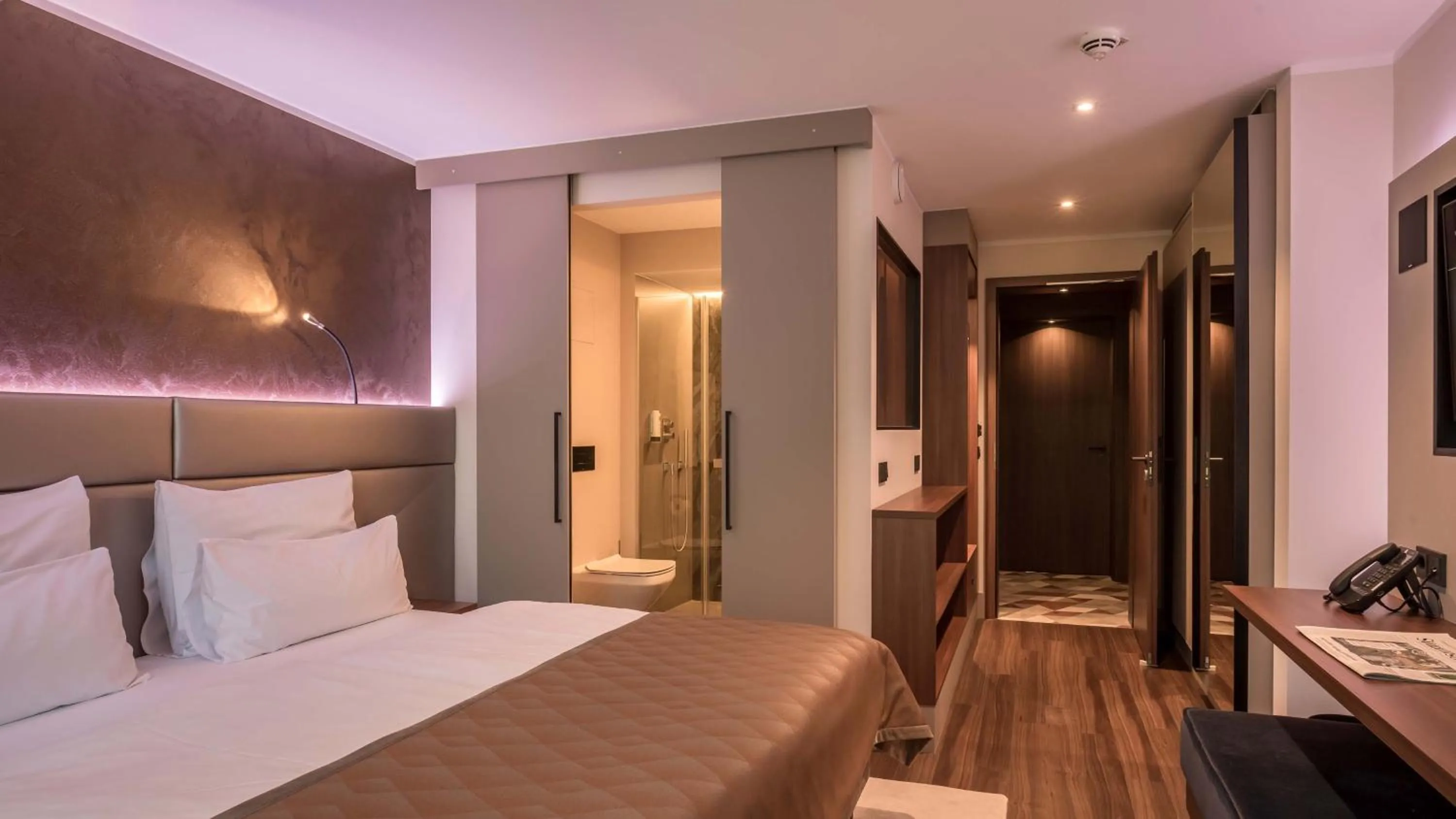 Bed in Innspire Hotel