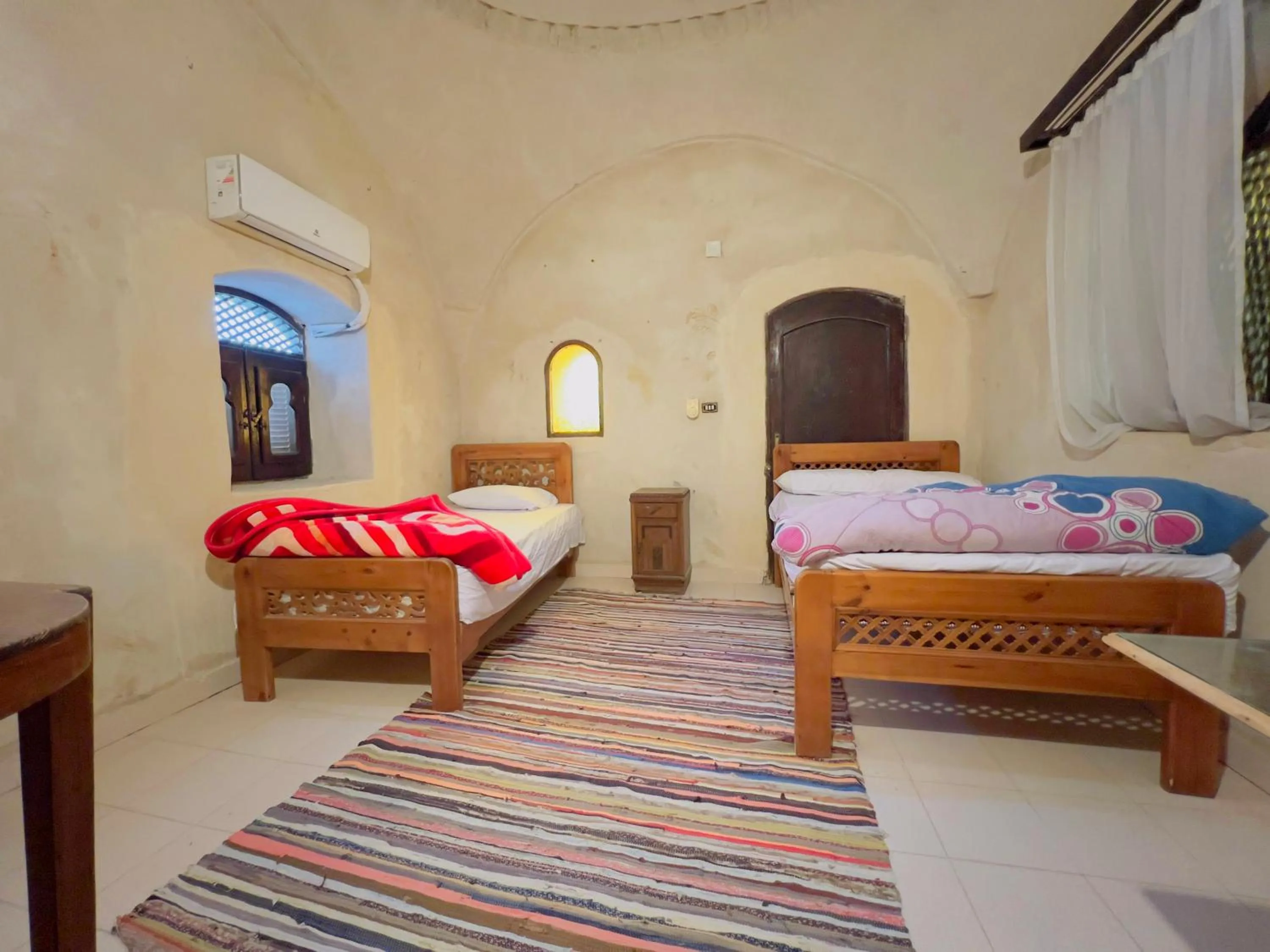 Bed in Zad El Mosafer Guest House