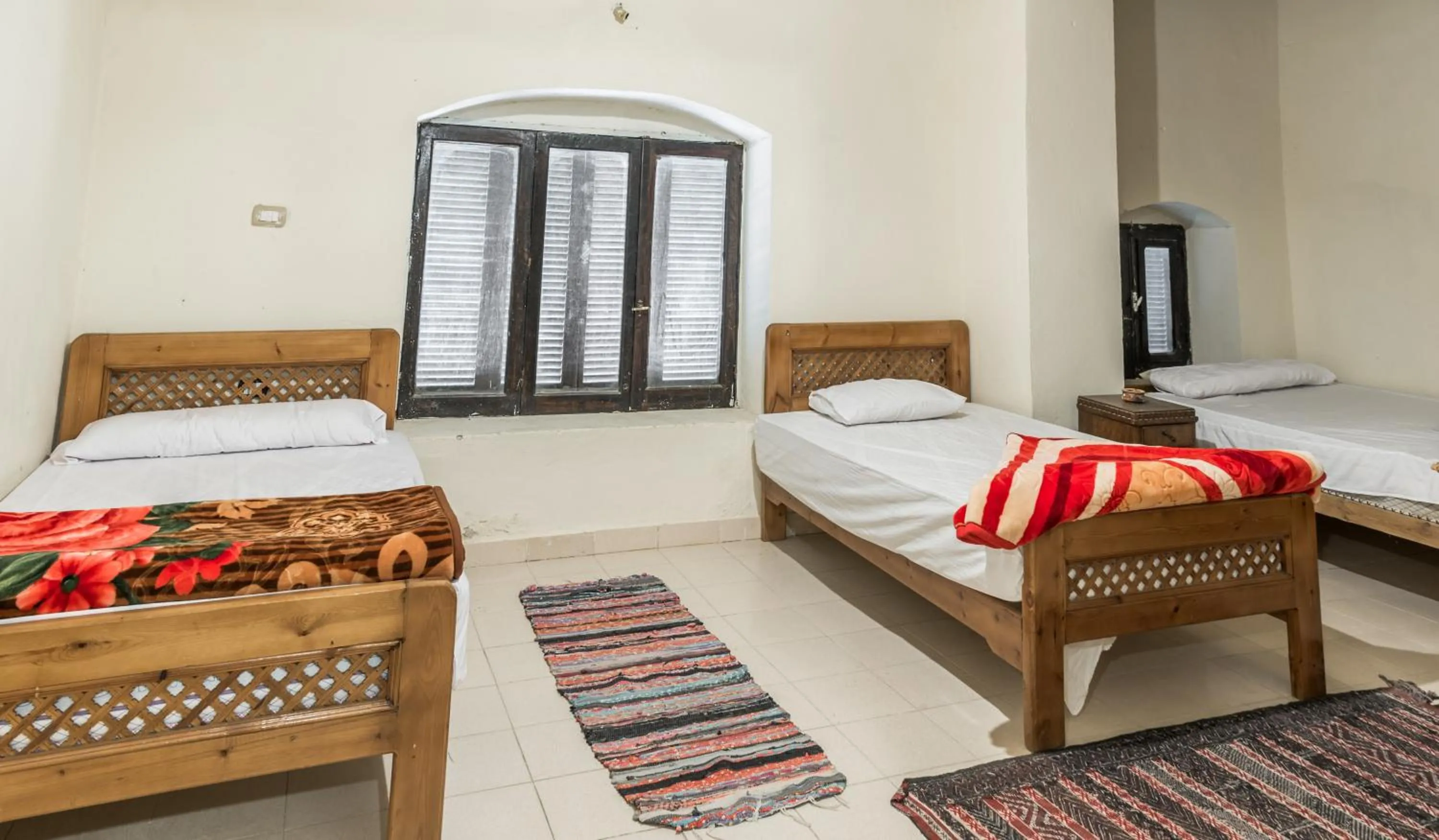 Bed in Zad El Mosafer Guest House