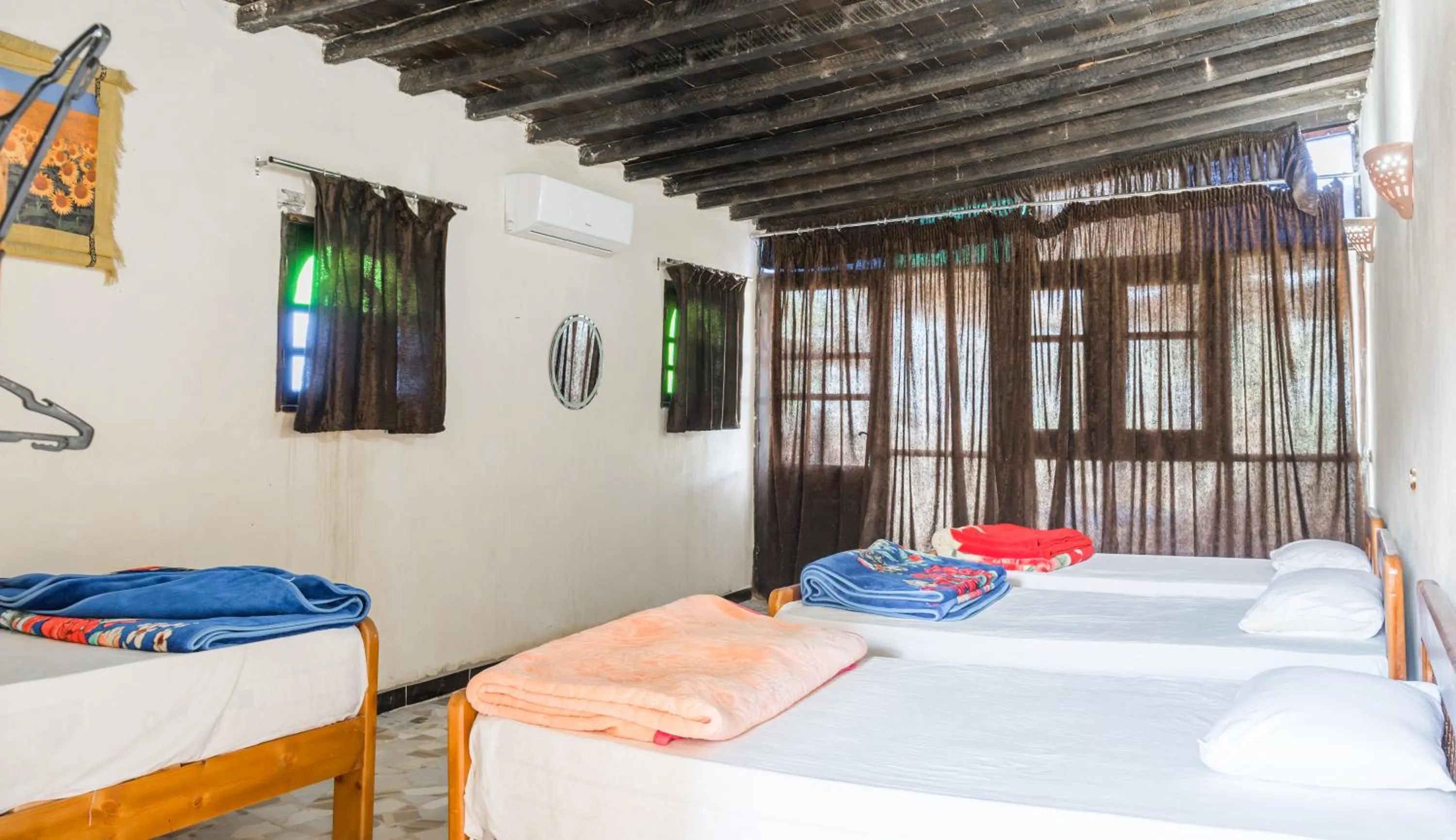 Bed in Zad El Mosafer Guest House