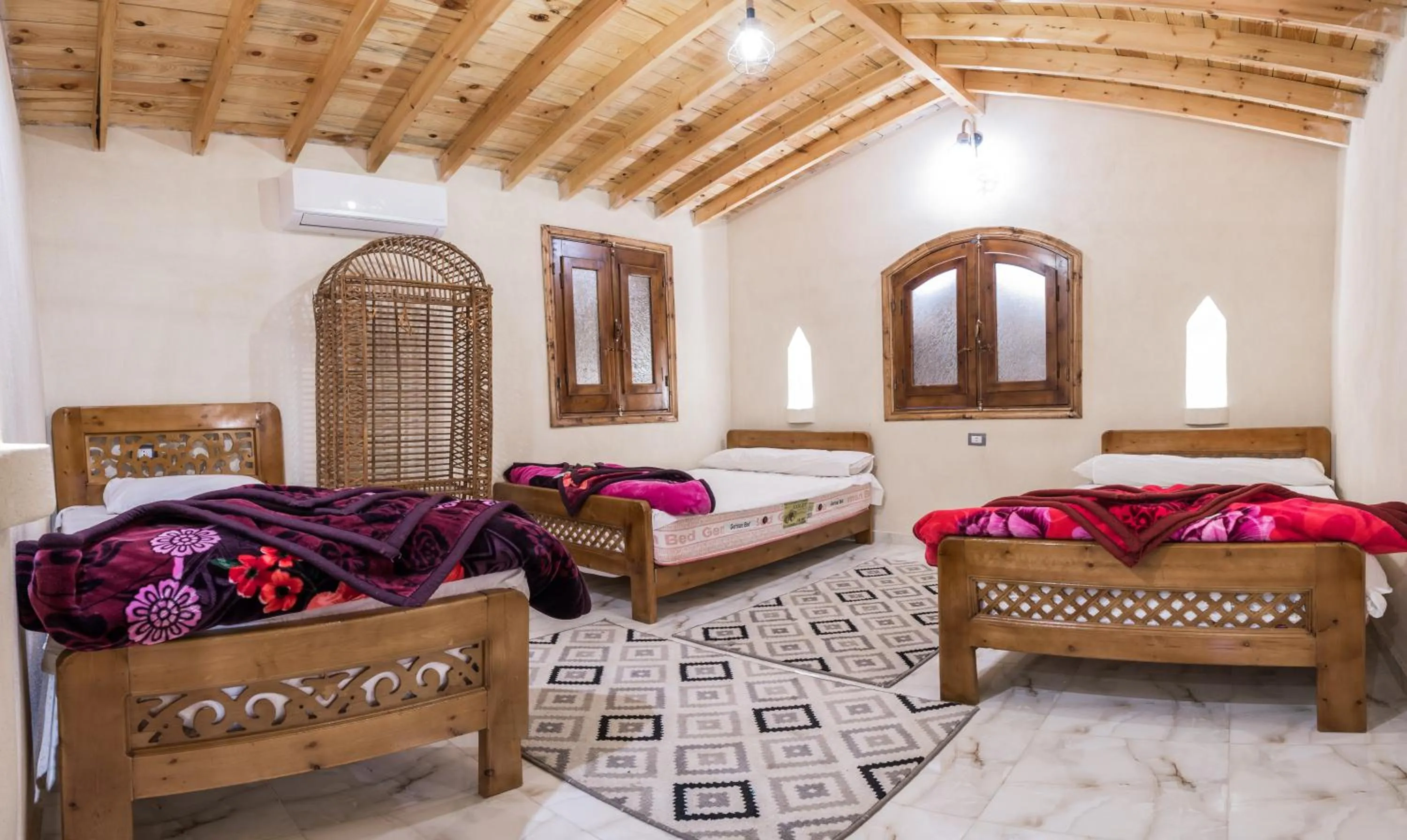 Bed in Zad El Mosafer Guest House