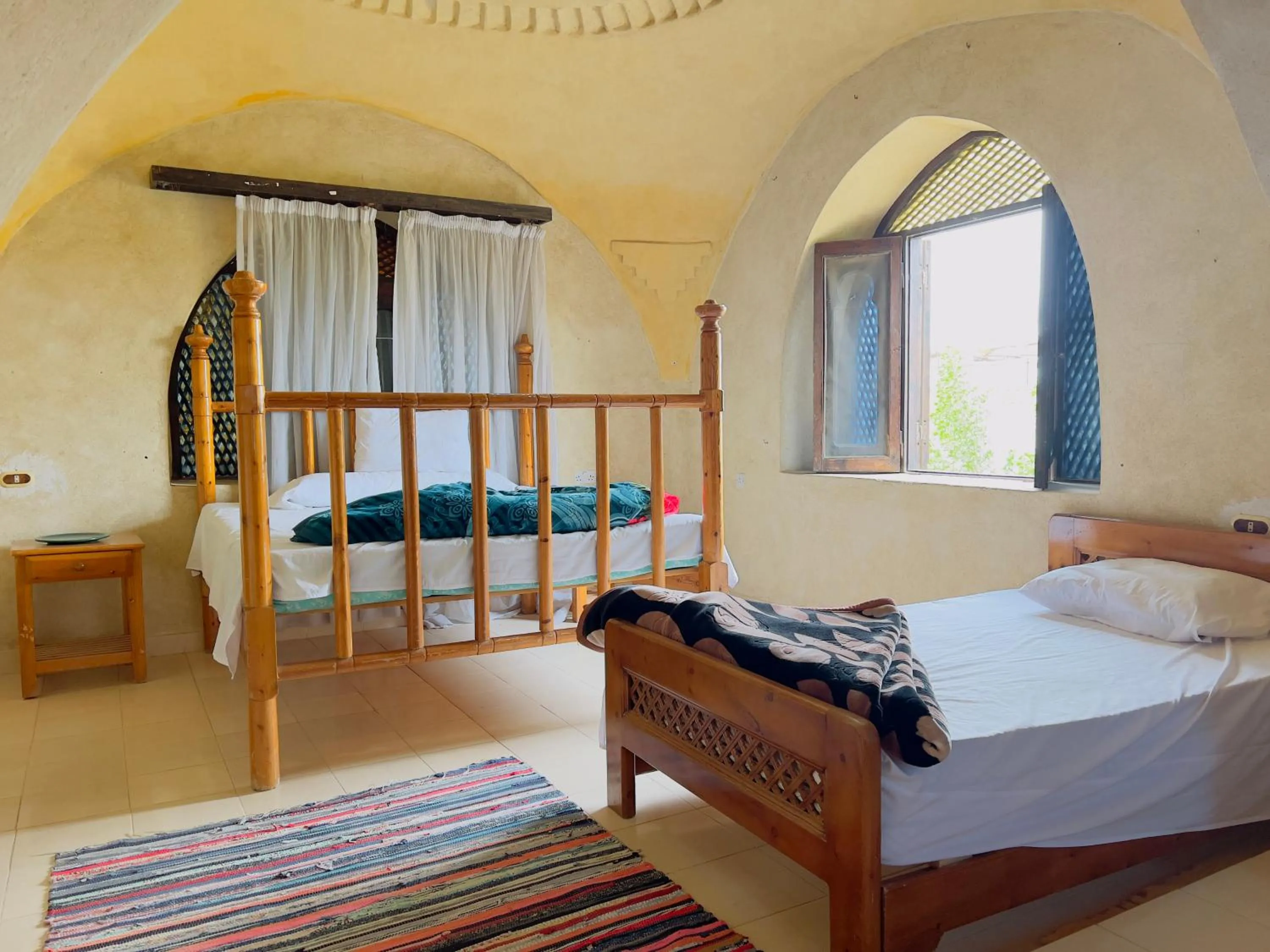 Bed in Zad El Mosafer Guest House