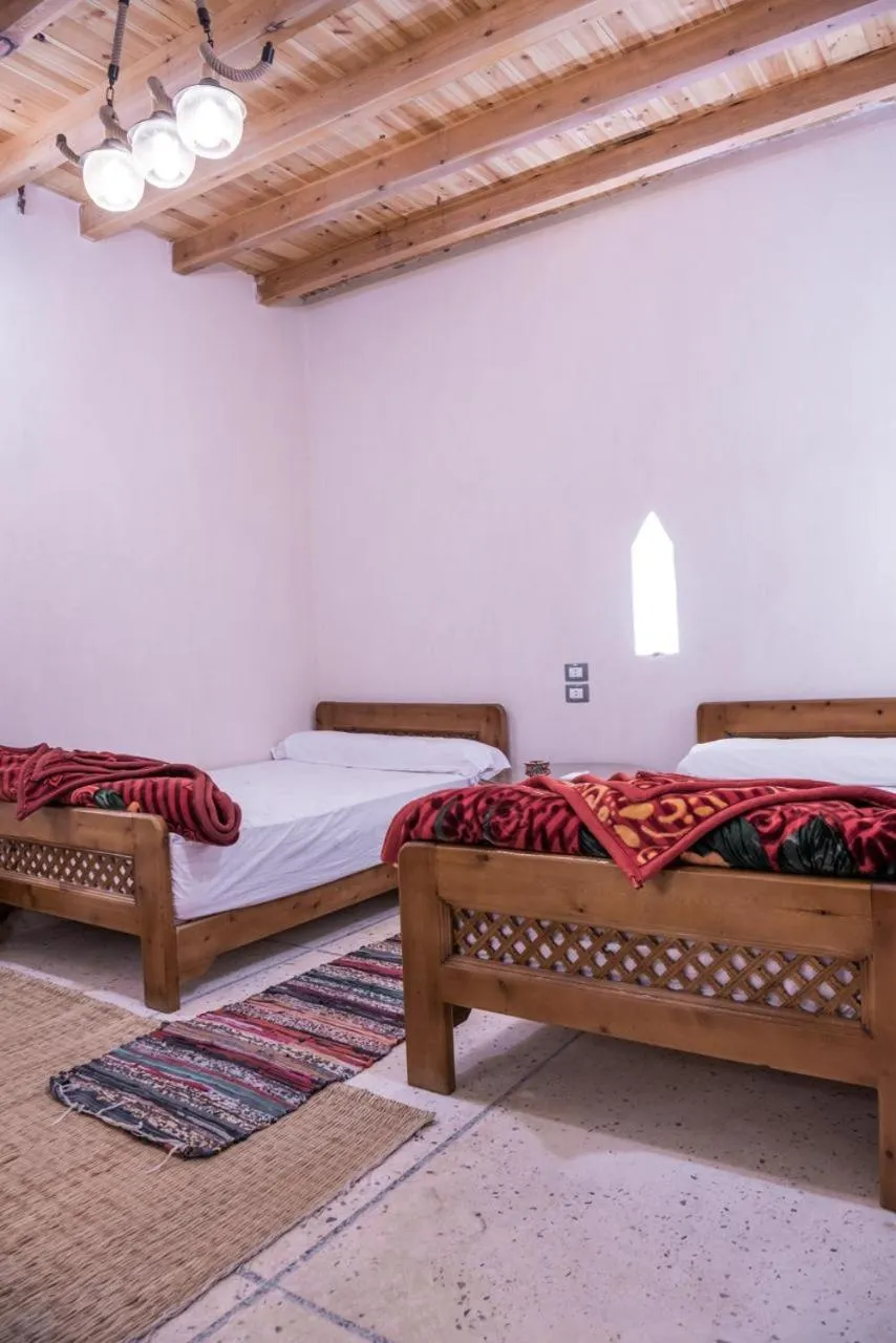 Bed in Zad El Mosafer Guest House